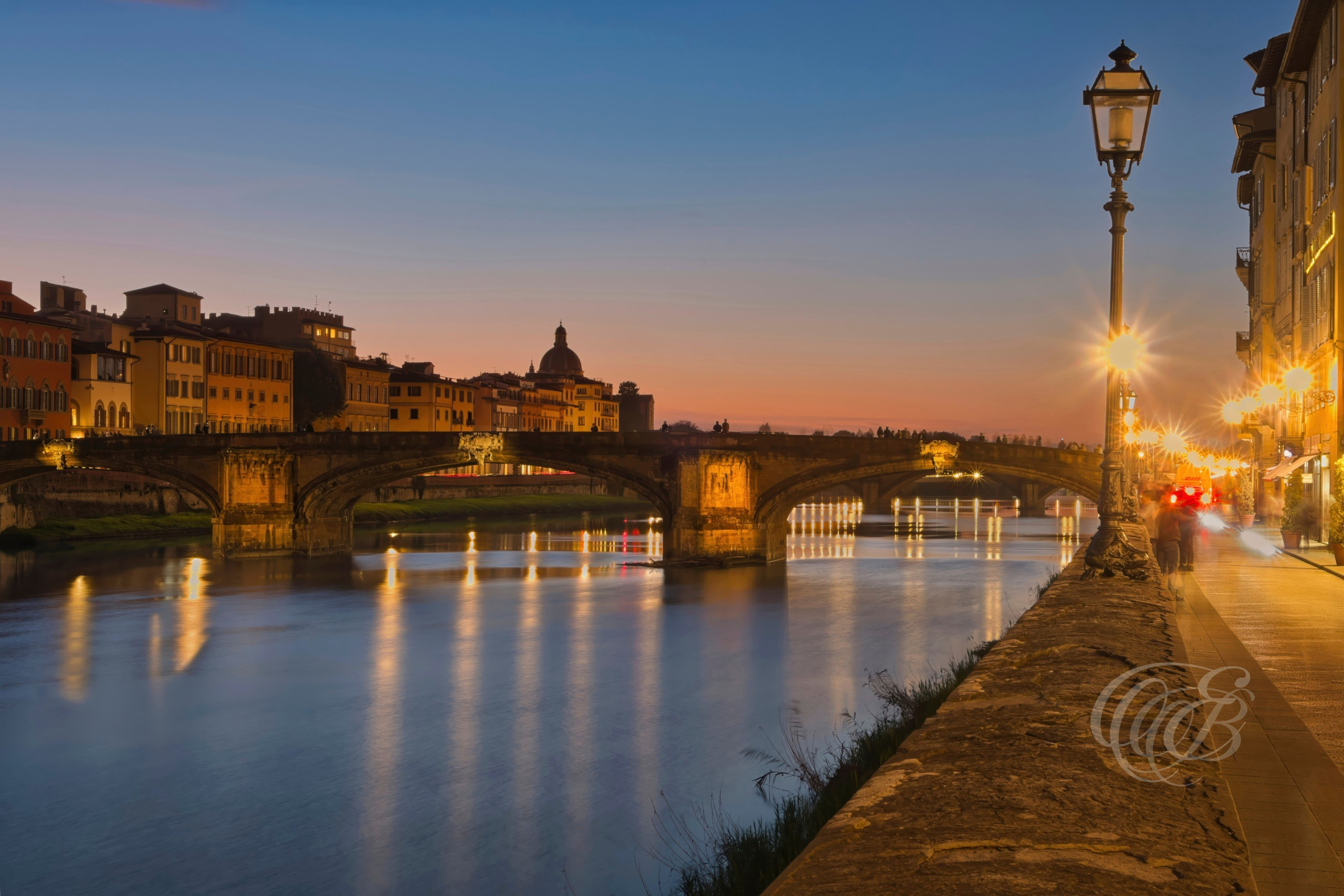 ITALY PHOTOGRAPHY — Ponte Santa Trinita — Ponte Santa Trinita crossing the Arno River, celebrated for its elegant Renaissance arches and historic connection between the two sides of Florence, Italy — Eduardo Bartoli Photography.
