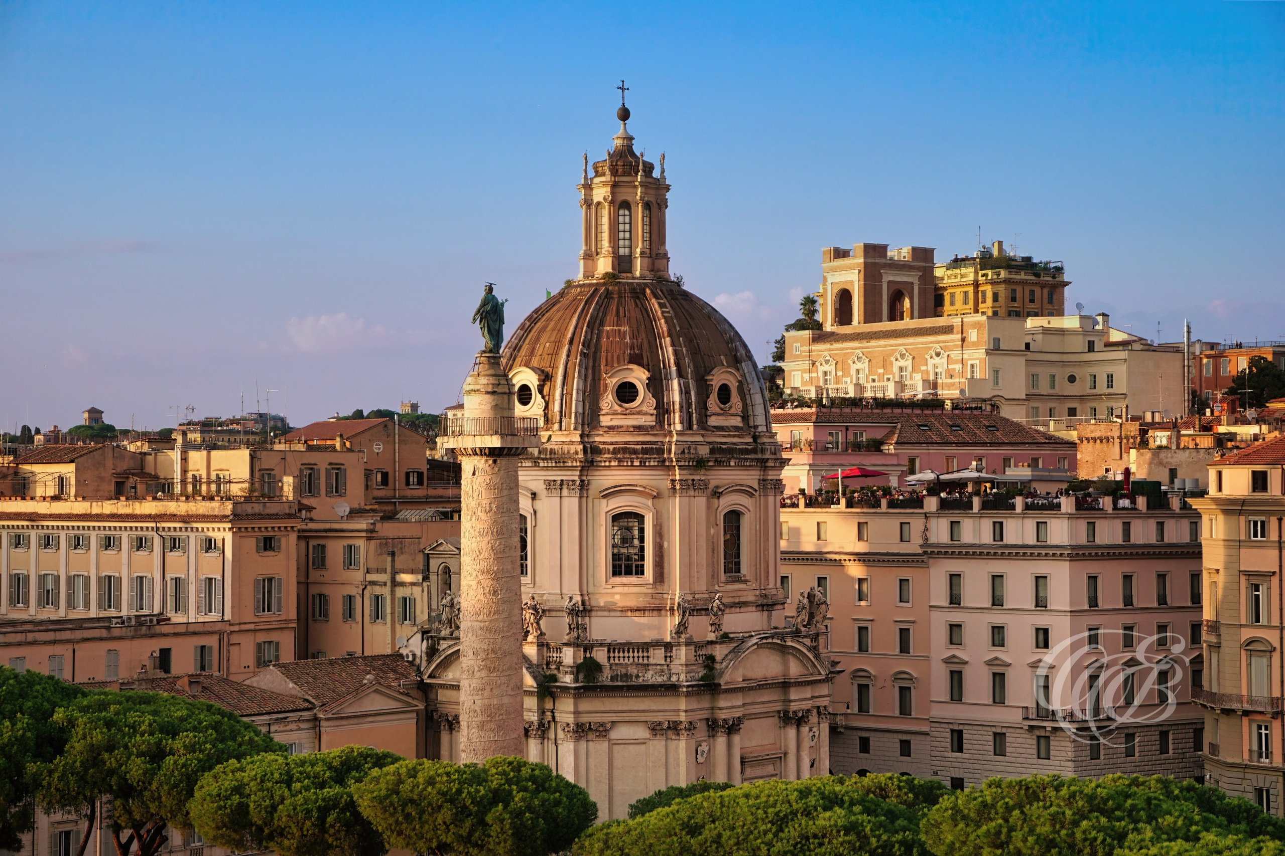ITALY TRAVEL PHOTOGRAPHY – ITALY – ROME — Church of the Most Holy Name of Mary — Baroque church near Trajan’s Column and Piazza Venezia featuring dome and historic façade architecture, Rome, Italy — Eduardo Bartoli Photography.