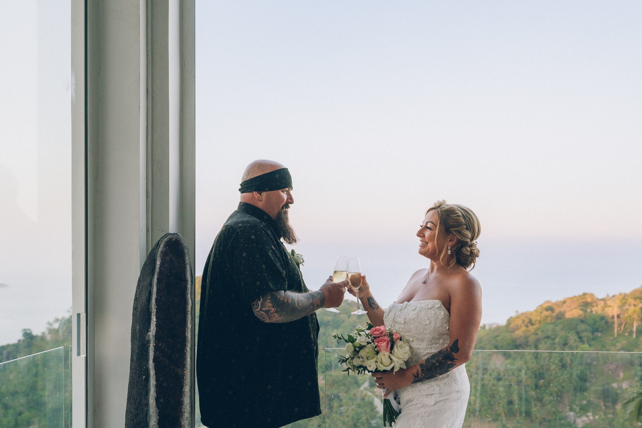 Bride and groom celebrating a sunset wedding at a villa in Koh Samui