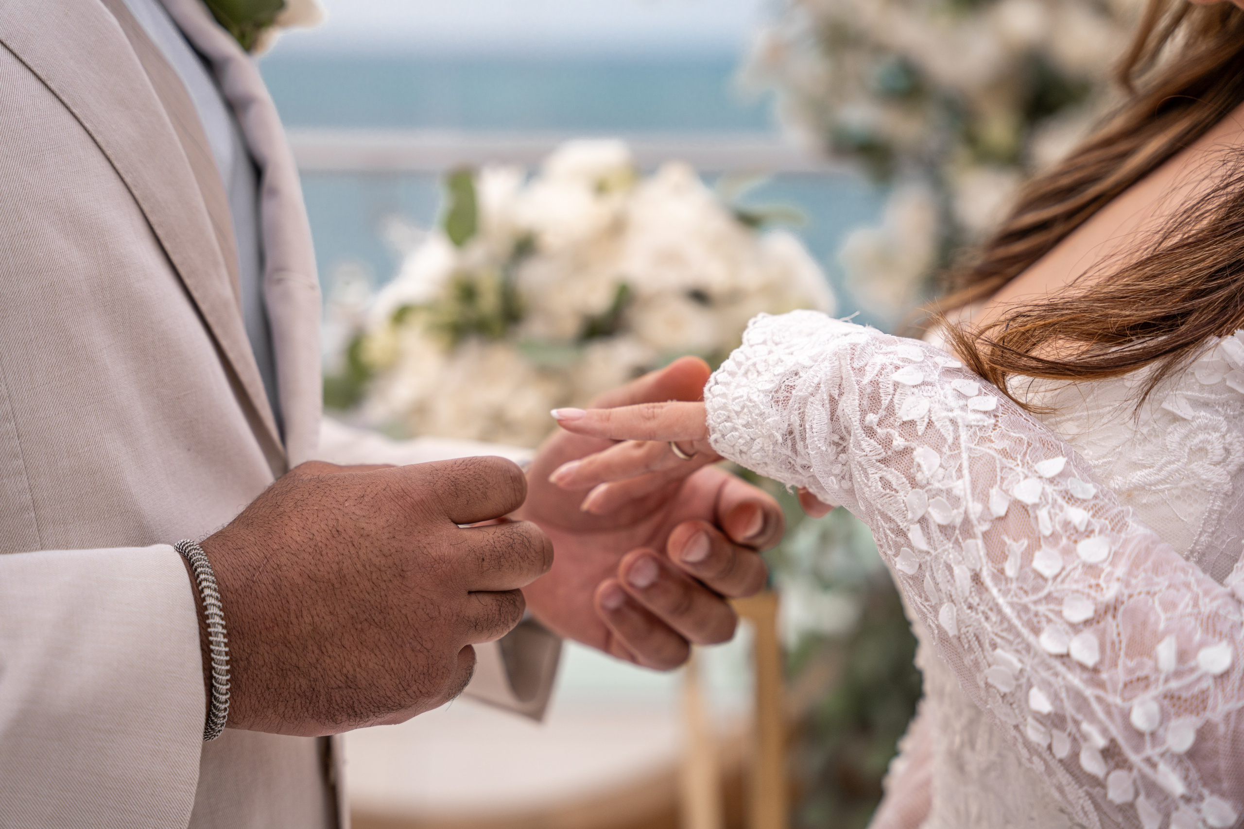Bride smiling at groom during ceremony in Riviera Maya