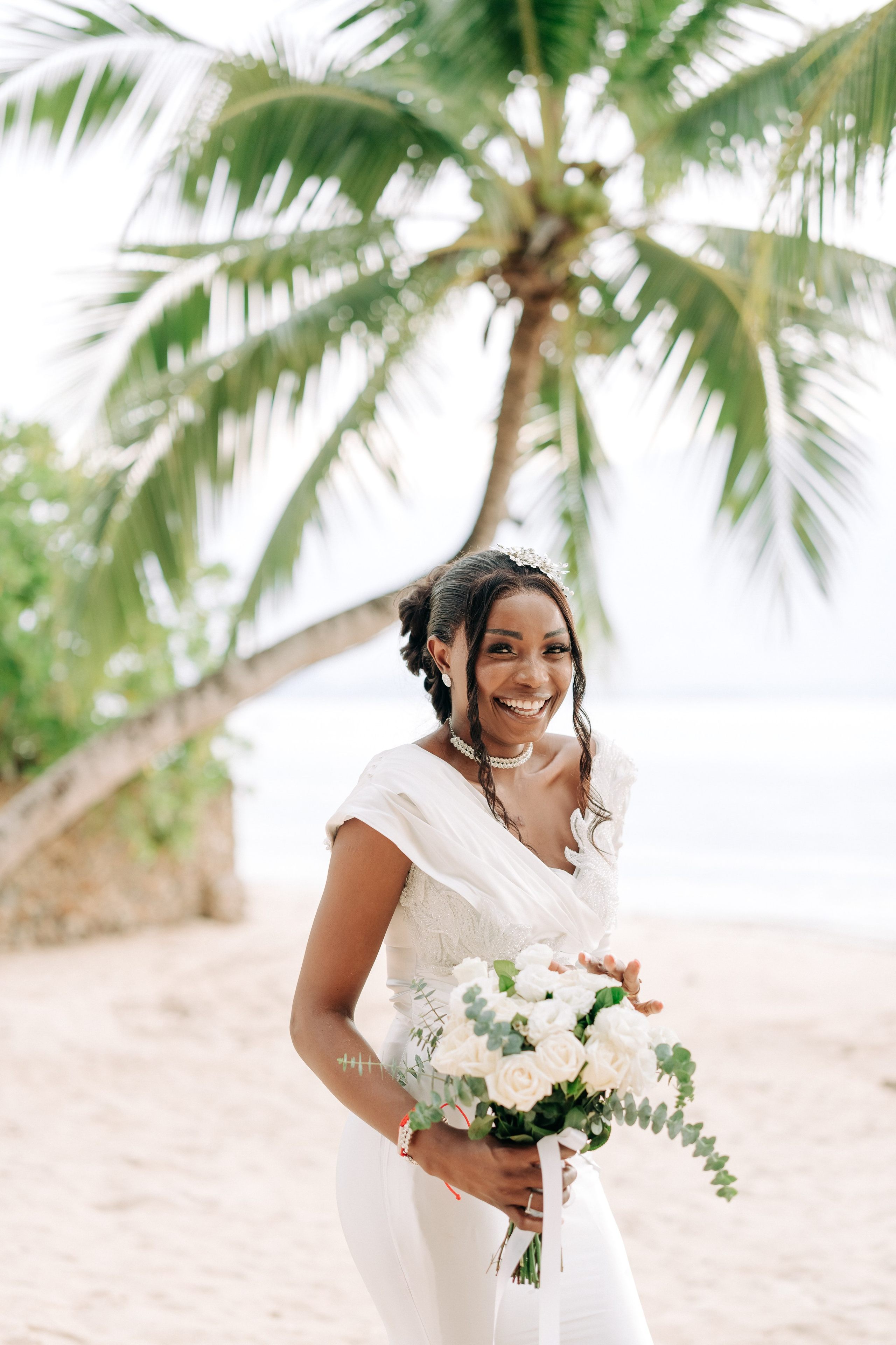 Romantic Buddhist wedding ceremony with guests in Koh Samui, Thailand