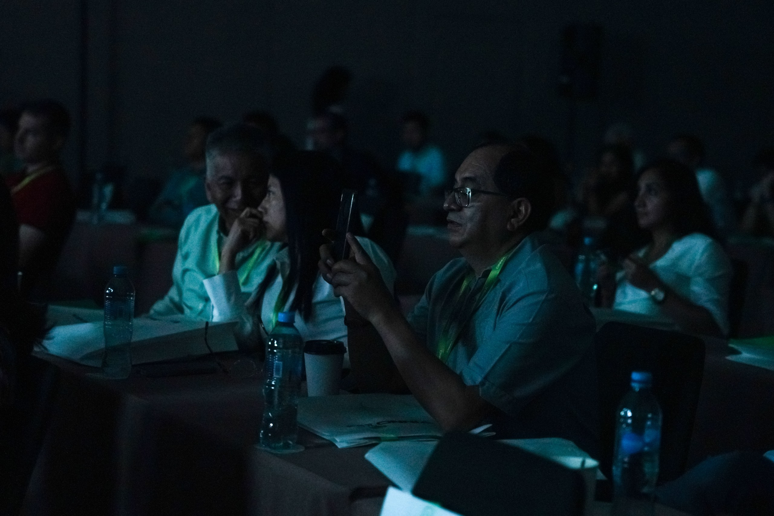 Corporate speaker introducing new initiatives to employees in the audience.