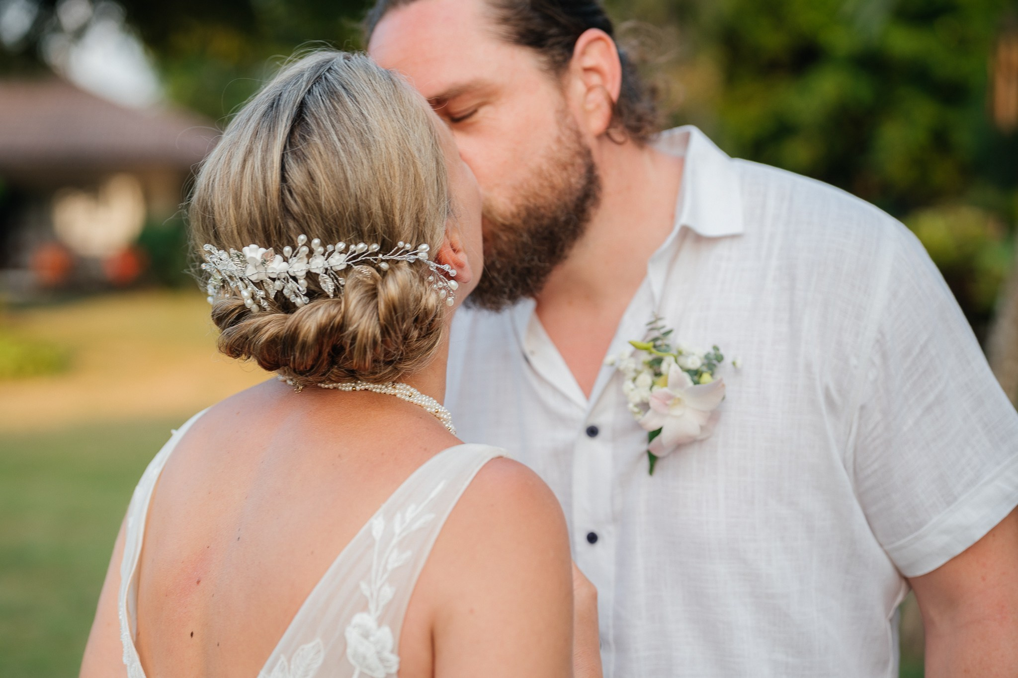 Destination beach wedding in Koh Samui, Thailand with the couple, family members and friends enjoying a tropical wedding ceremony by the sea