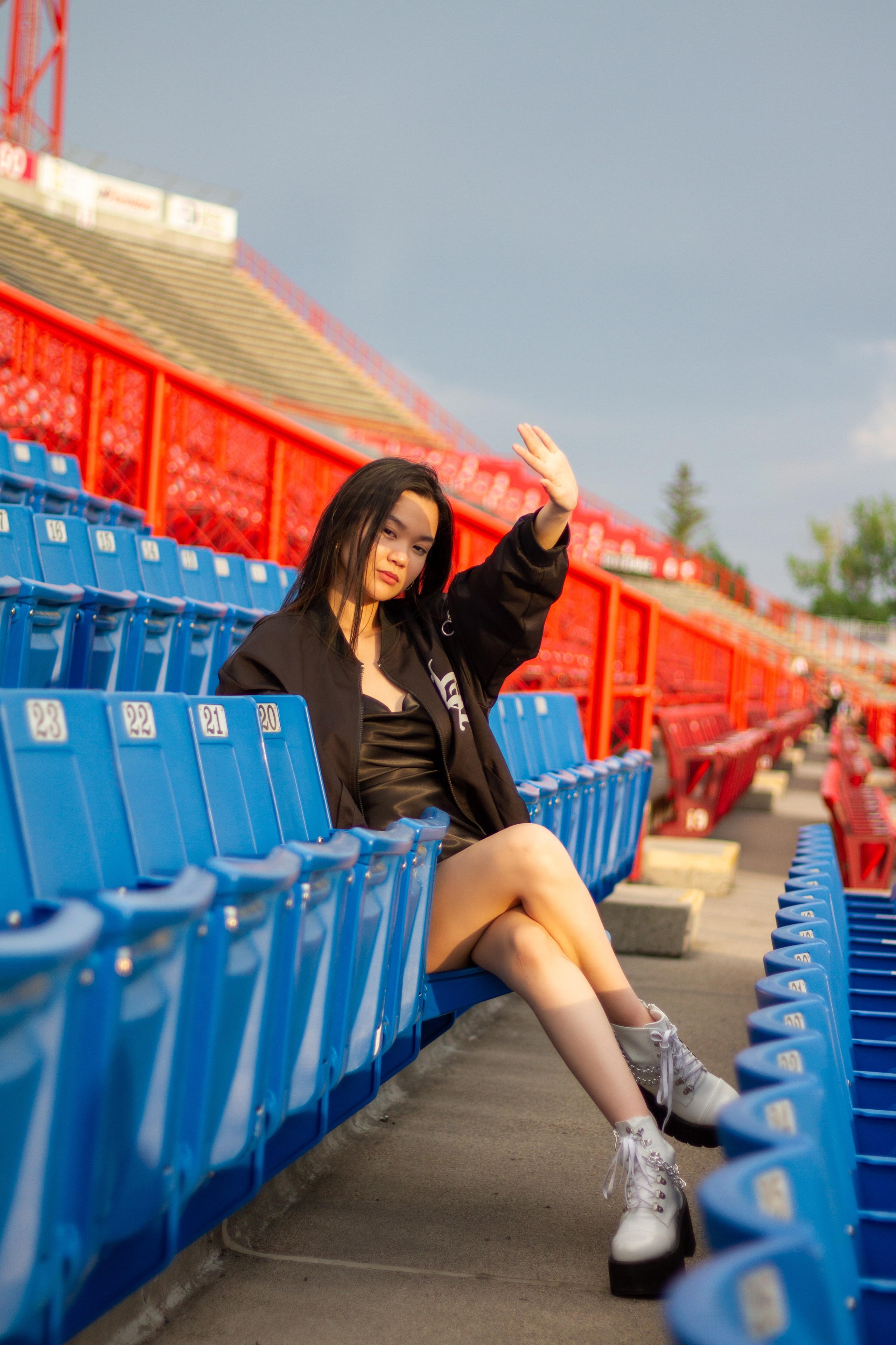 Model Ann at McMahon Stadium: A Stunning Photoshoot Under the Stadium Lights. ProFly Media Inc. — Cinematic photo and video production for brands, businesses, and spaces in Calgary