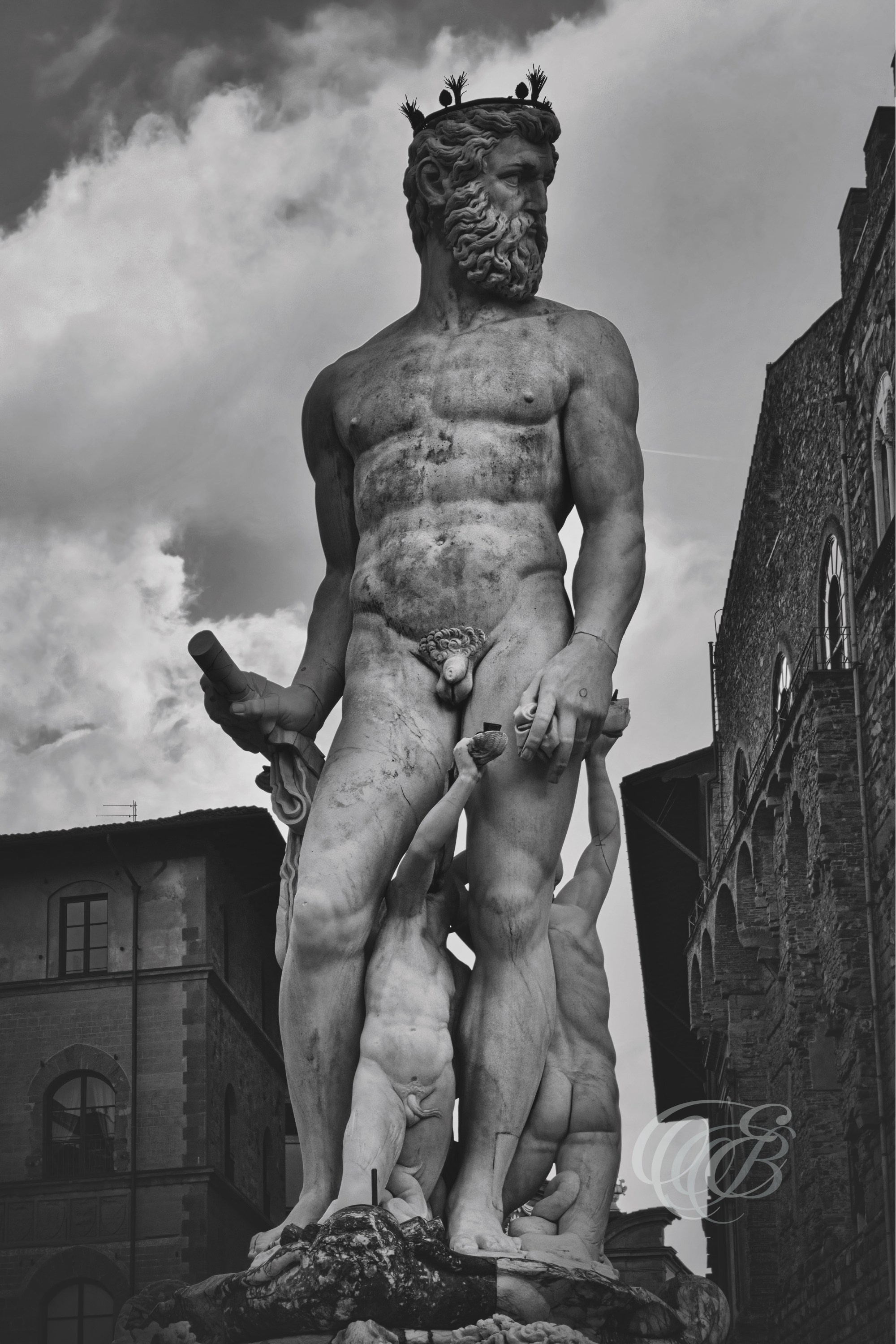ITALY – FLORENCE — Fountain of Neptune Sunset Matte Black and White — Renaissance fountain by Bartolomeo Ammannati with Neptune sculpture in Piazza della Signoria, showing stone and bronze details under sunset lighting conditions, Florence, Italy — Eduardo Bartoli Photography.