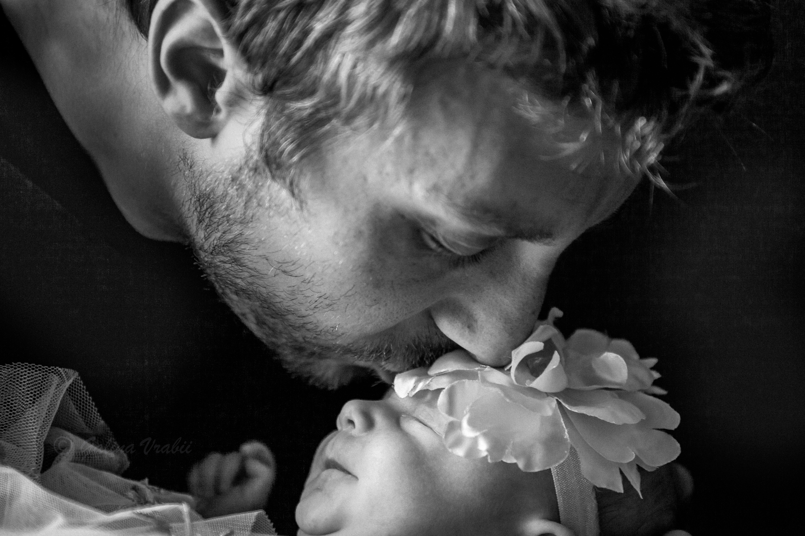 Artistic black-and-white family portrait capturing emotional connection, Ontario.