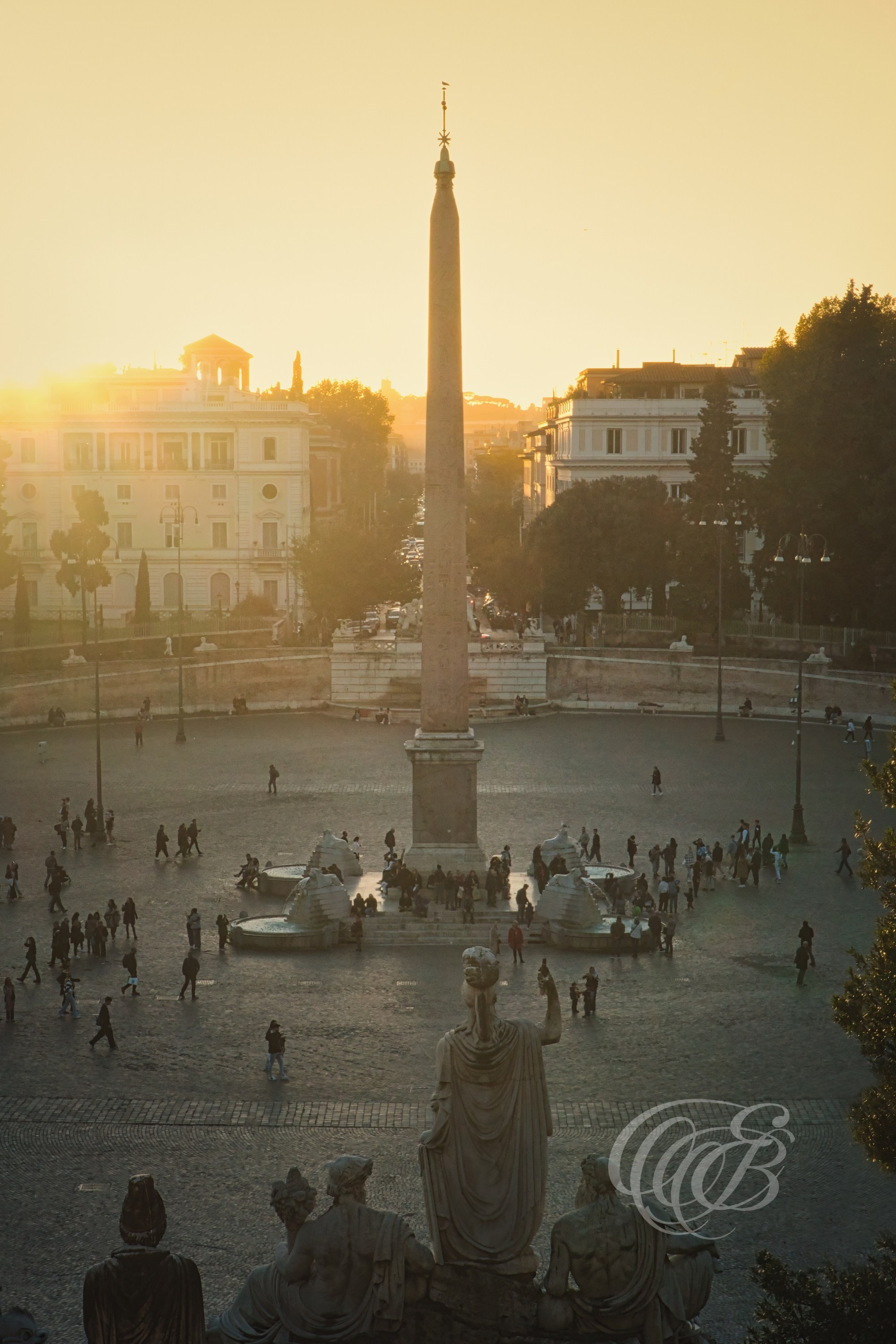 ITALY TRAVEL PHOTOGRAPHY – ITALY – ROME — Sunset at Piazza del Popolo — Historic Roman square featuring twin churches, obelisk, and surrounding Renaissance architecture illuminated by evening light, Rome, Italy — Eduardo Bartoli Photography.