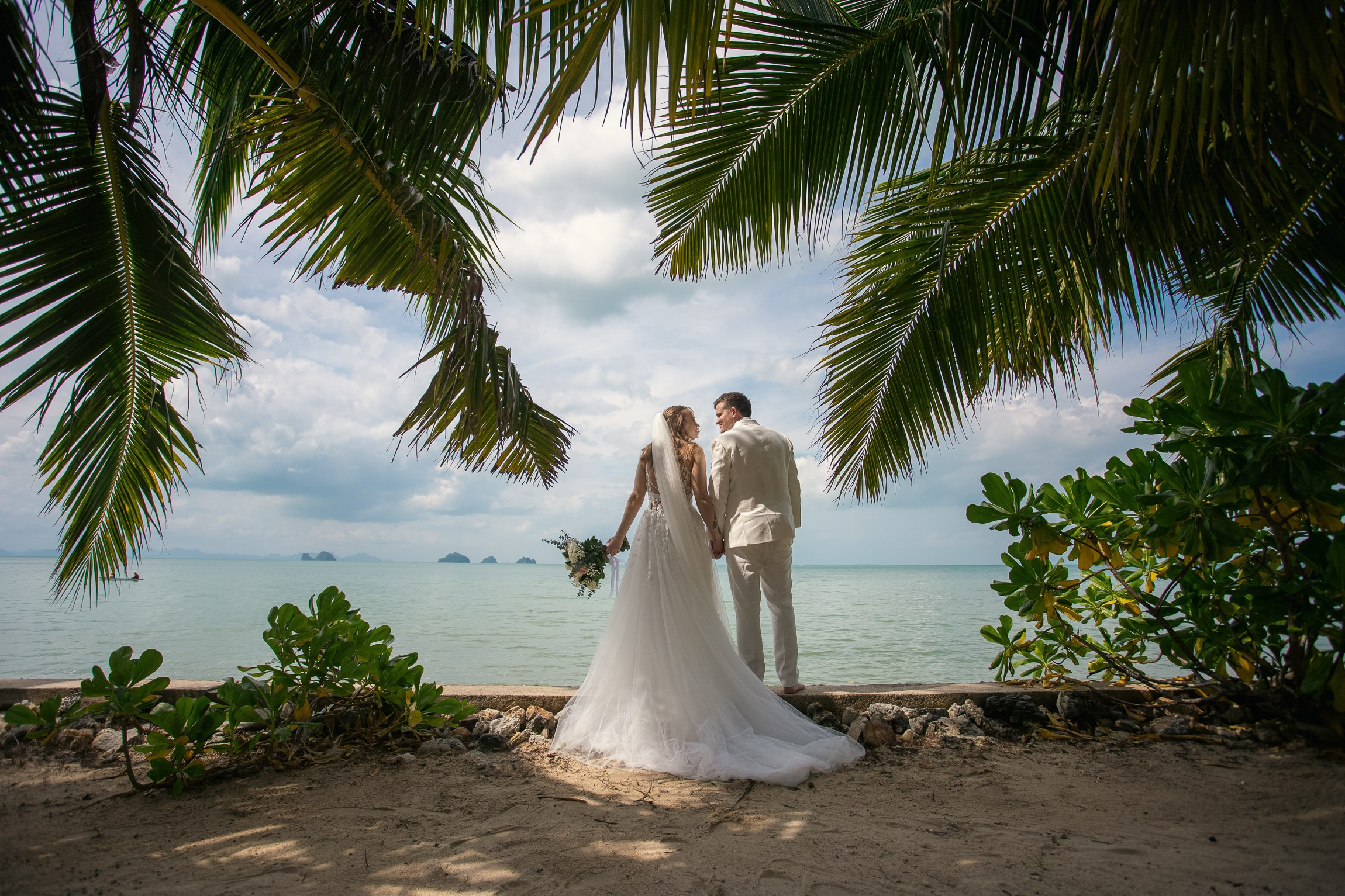 Elegant escape wedding for two on a beautiful beach in Koh Samui, Thailand with romantic wedding decorations