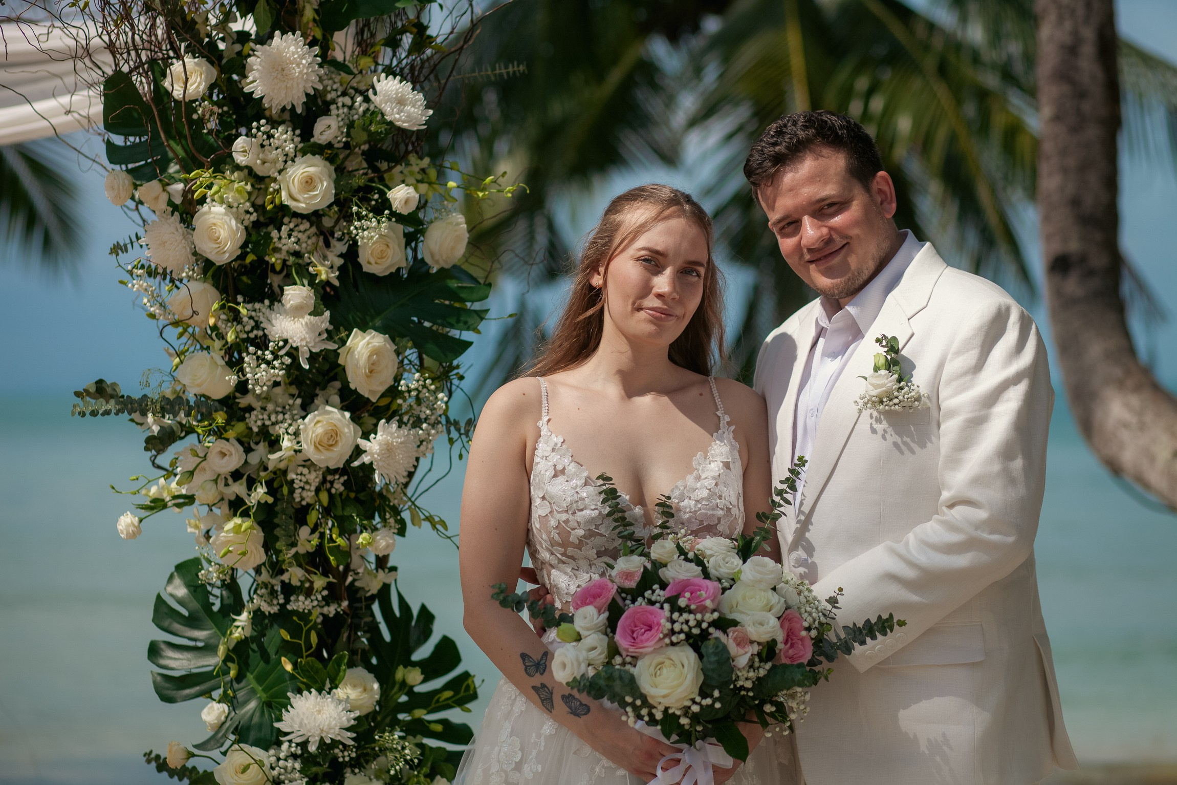 Elegant escape wedding for two on a beautiful beach in Koh Samui, Thailand with romantic wedding decorations