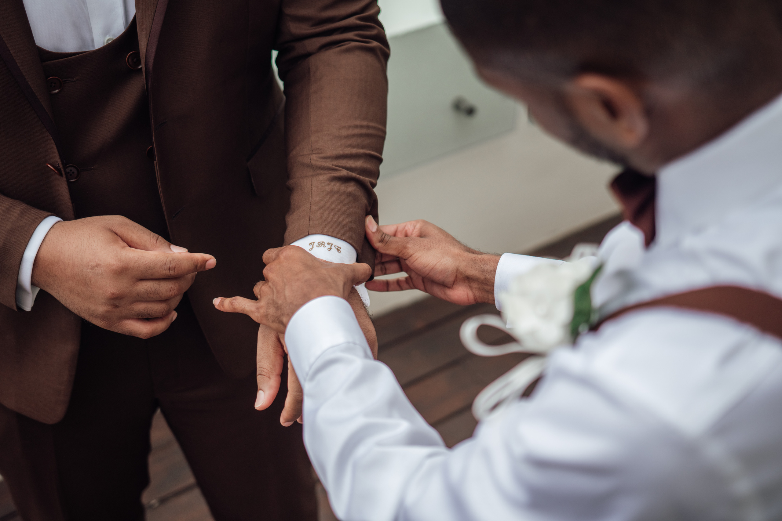 Groom’s look photographed in editorial style for luxury wedding brand