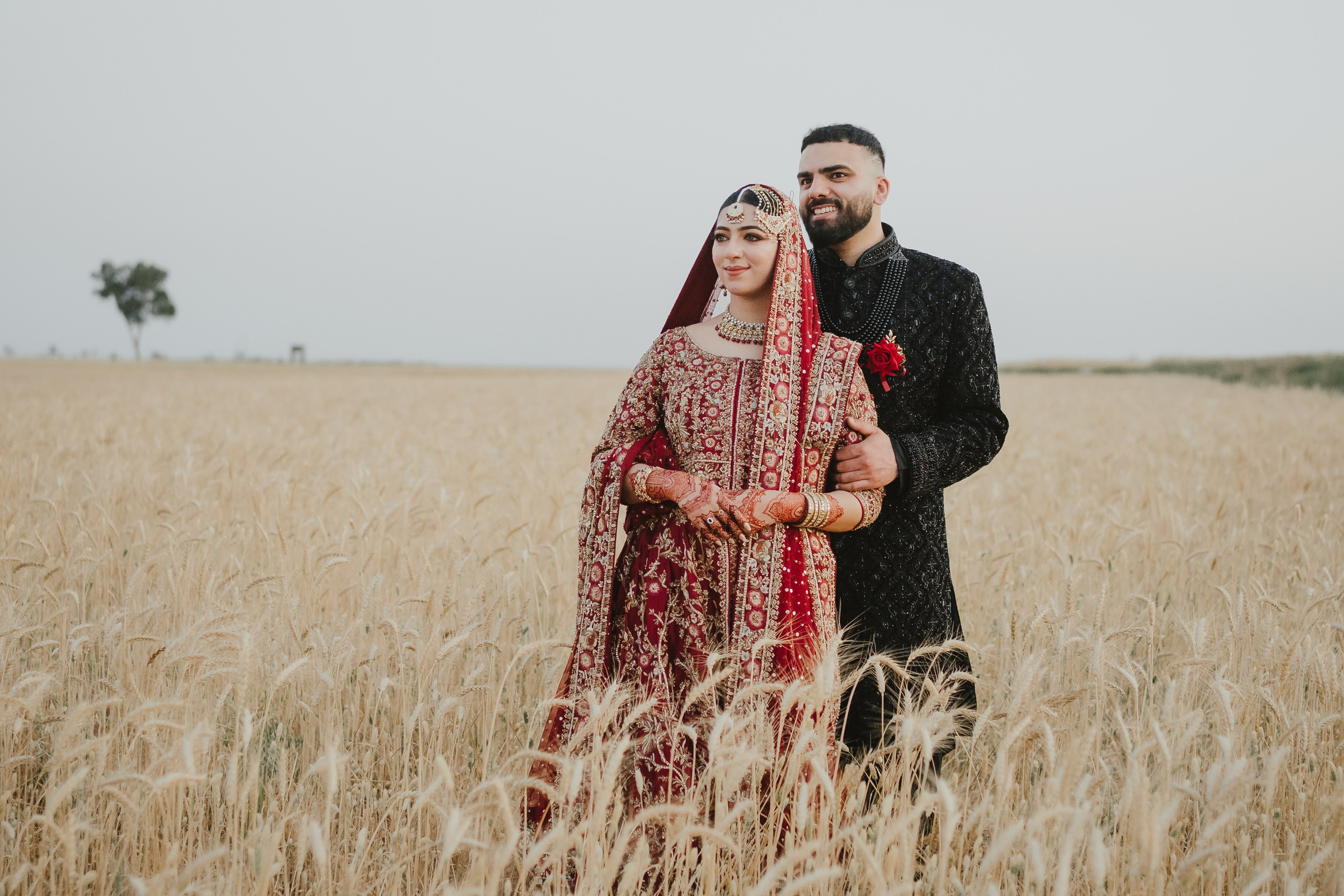 Couple shoot in the fields during sunset 