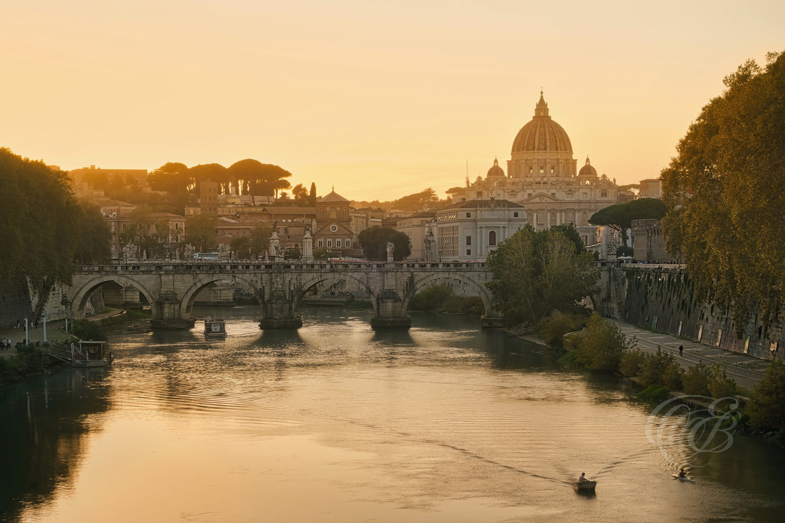 ITALY PHOTOGRAPHY — Ponte Sant'Angelo and St. Peter's Basilica Dome — Ponte Sant'Angelo leading across the Tiber River toward the dome of St. Peter's Basilica, linking two of Rome's most historic landmarks, Rome, Italy — Eduardo Bartoli Photography.