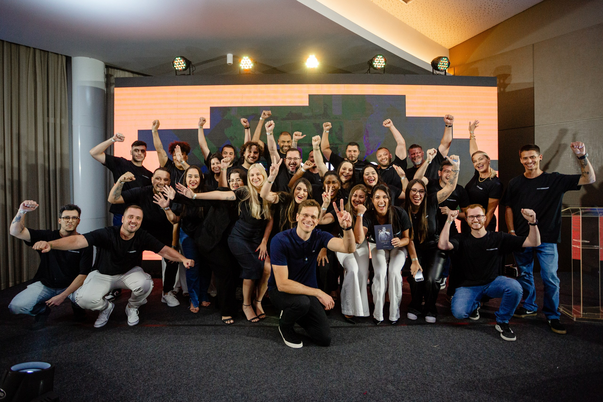 Fotografia de evento corporativo Triveni Day com César Cielo em Itajaí