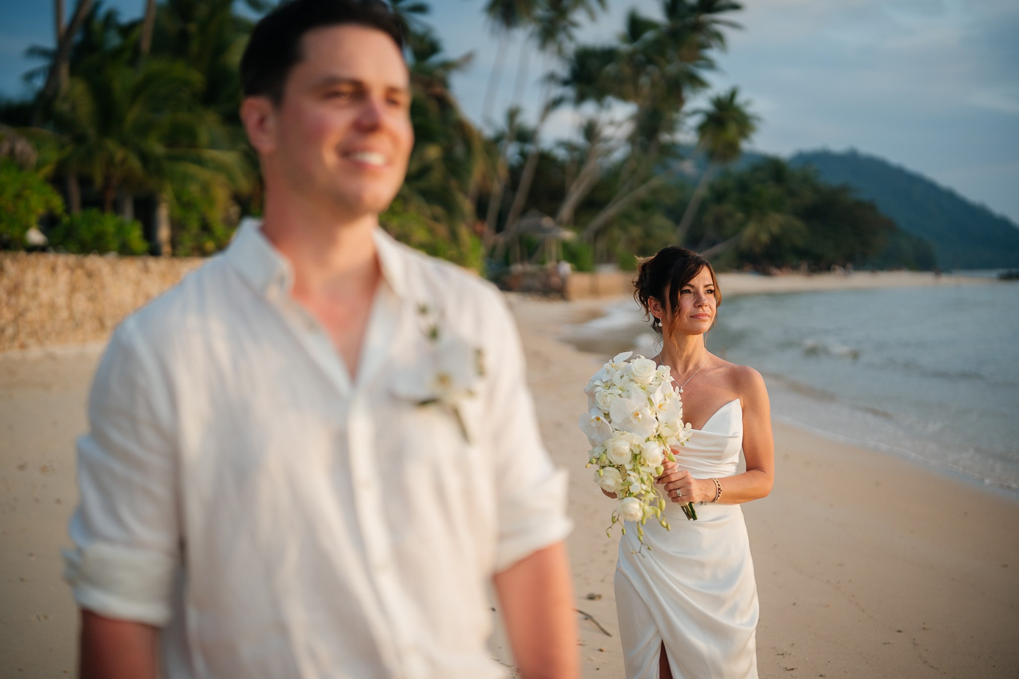Romantic just for 2 beach wedding in Koh Samui, Thailand, featuring an intimate elopement ceremony with tropical ocean views and floral decor.