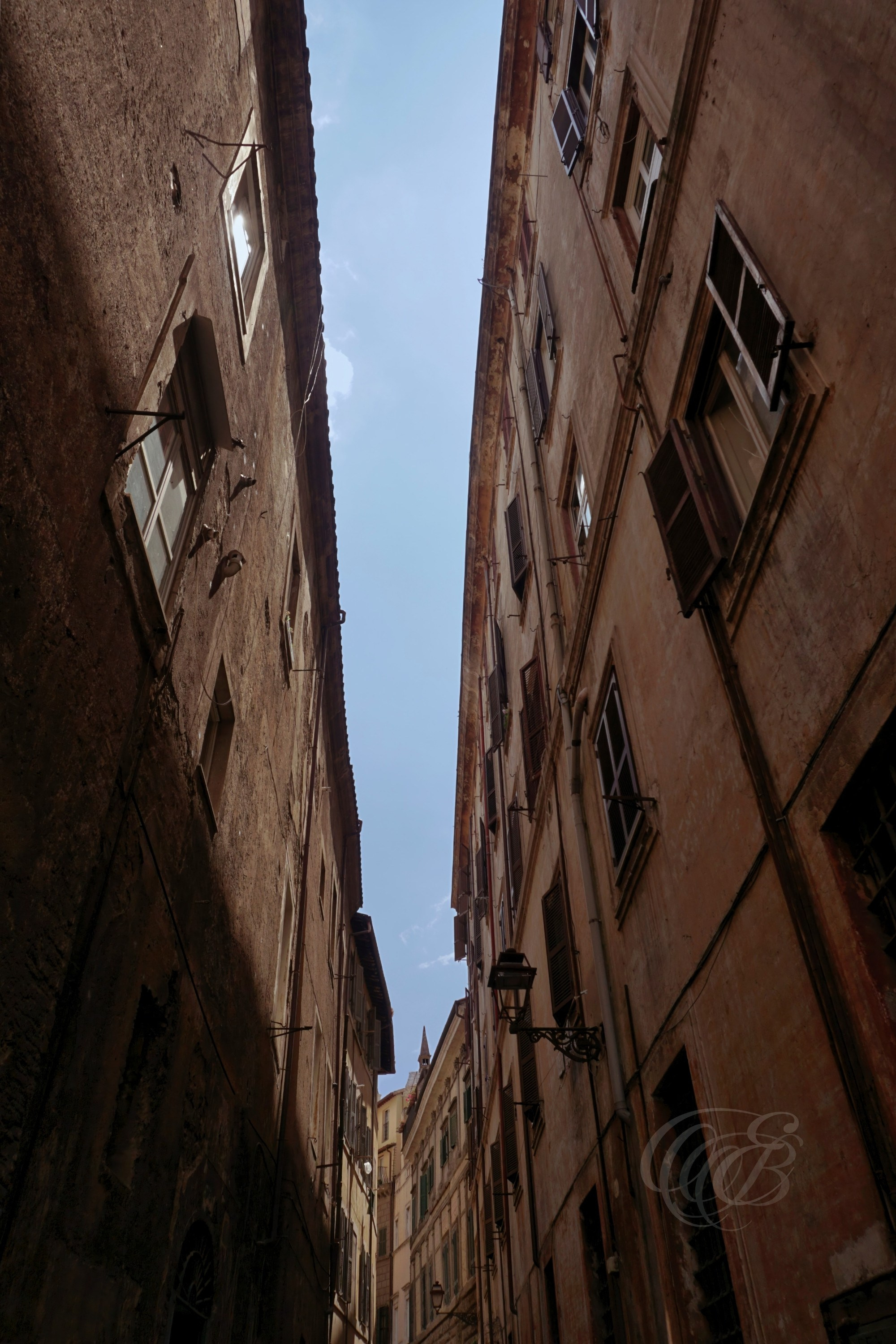 Street Photography — Rome, Italy — Narrow Street — Narrow street in historic Rome, reflecting the intimate scale, traditional architecture, and centuries-old urban fabric that characterize the city’s older neighborhoods — Eduardo Bartoli Photography.