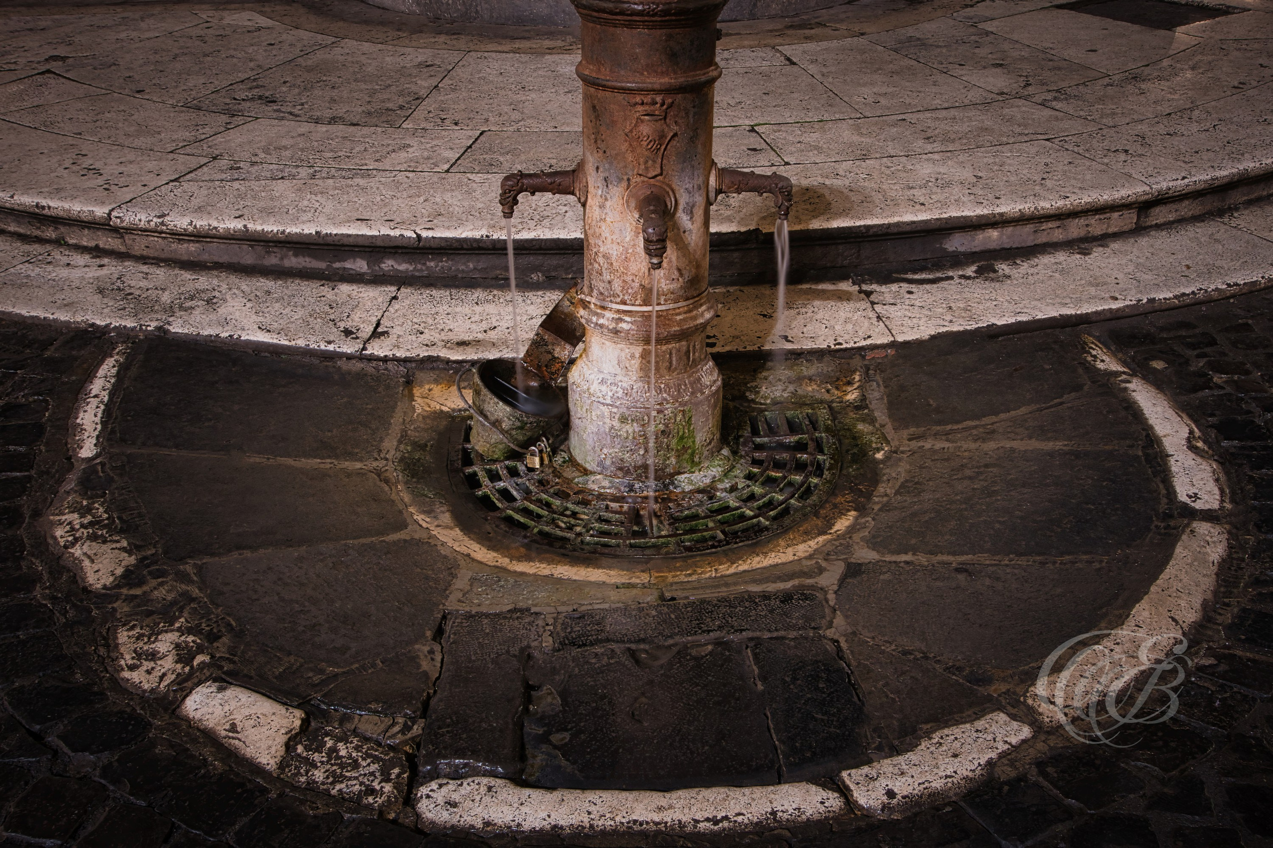 Street Photography — Rome, Italy — Piazza della Rotonda Nasoni — Traditional Roman drinking fountain, known as a nasone, near Piazza della Rotonda, part of the public water system that has served the city since the nineteenth century — Eduardo Bartoli Photography.