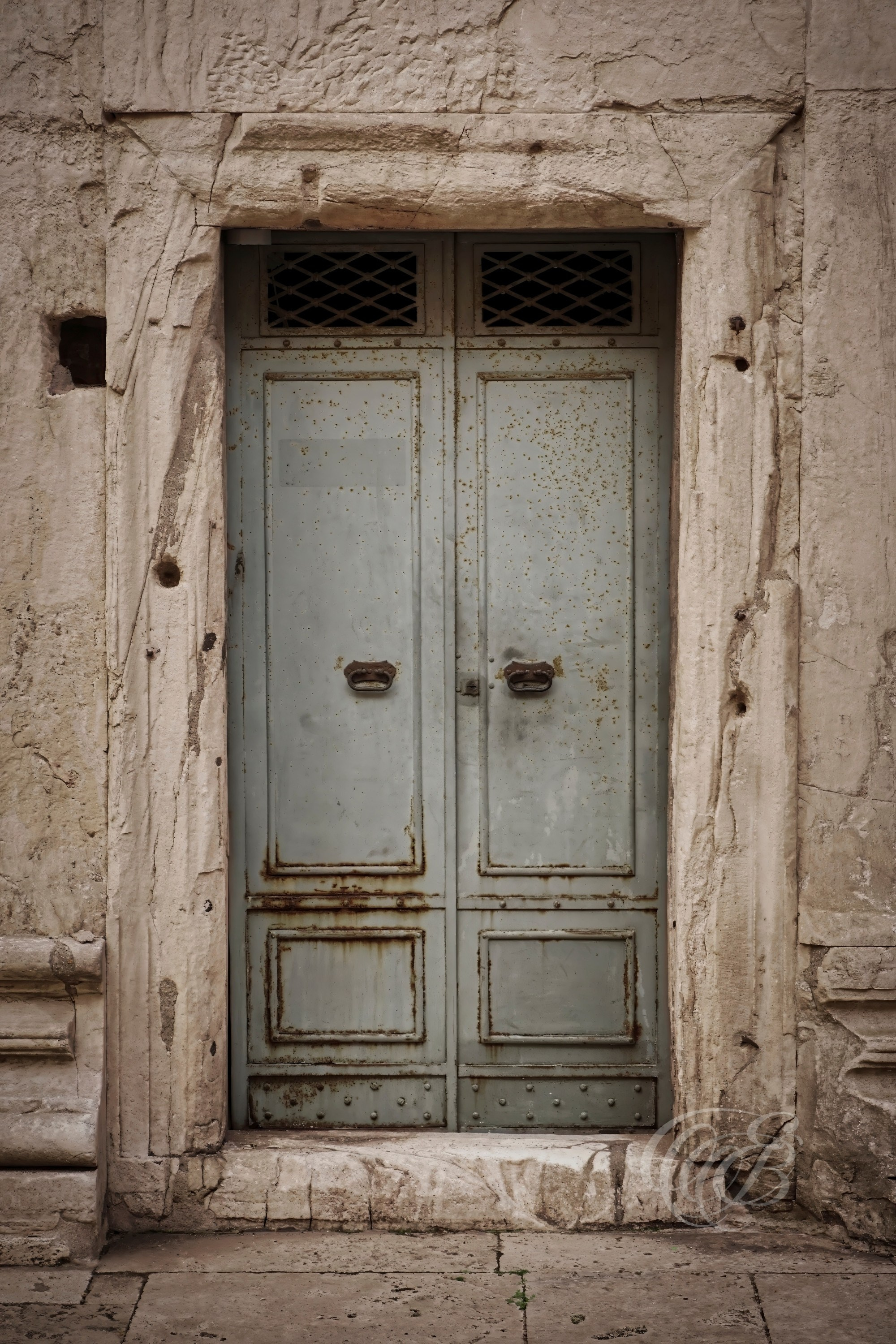 Street Photography — Rome, Italy — Small Door at the Pantheon — Architectural detail at Rome’s historic Pantheon, reflecting the smaller elements, ancient fabric, and centuries of transformation surrounding one of the city’s best-preserved Roman monuments — Eduardo Bartoli Photography.