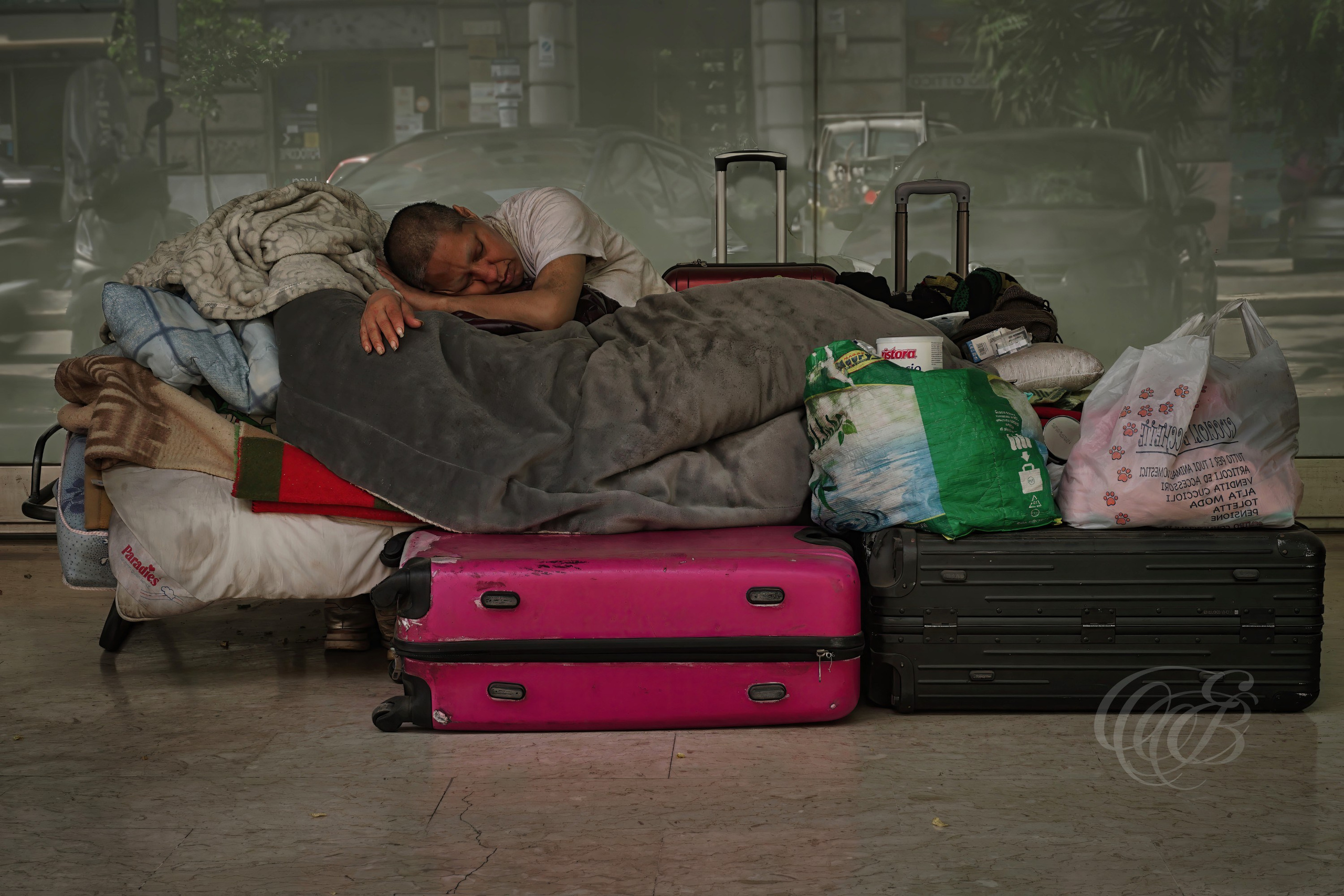 Street Photography — Rome, Italy — Homeless Dreaming — Homelessness and everyday life on the streets of Rome, reflecting a human and social reality that exists alongside the historic beauty and urban rhythms of the city — Eduardo Bartoli Photography.