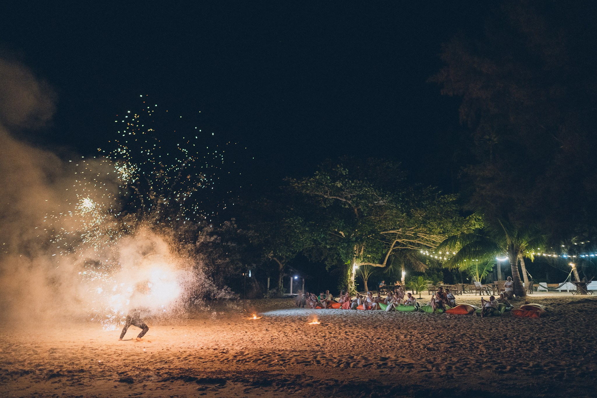 Professional fire dancers performing at a luxury wedding in Thailand