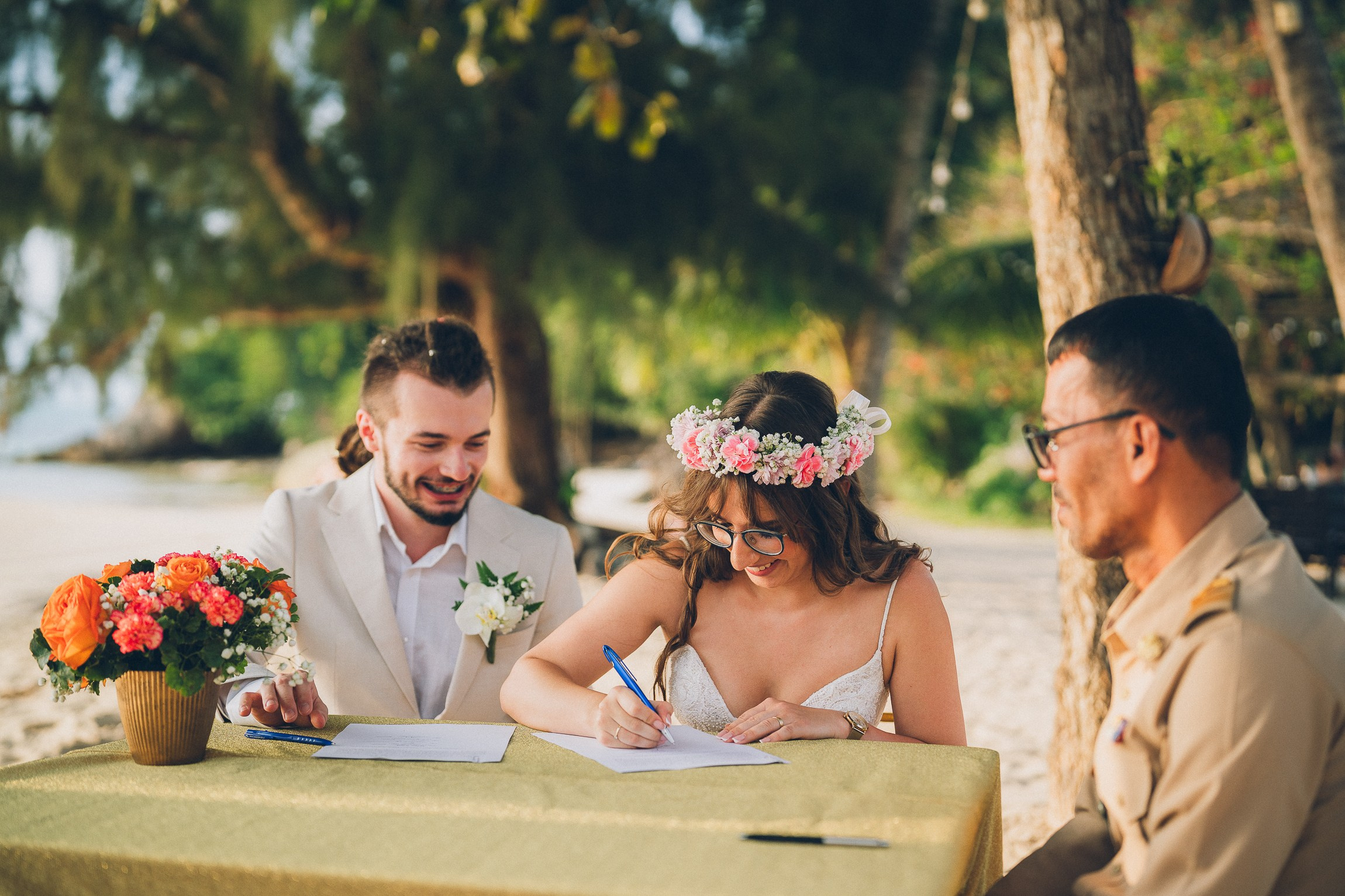 Romantic escape wedding ceremony for two on a secluded beach in Koh Samui, Thailand at sunset