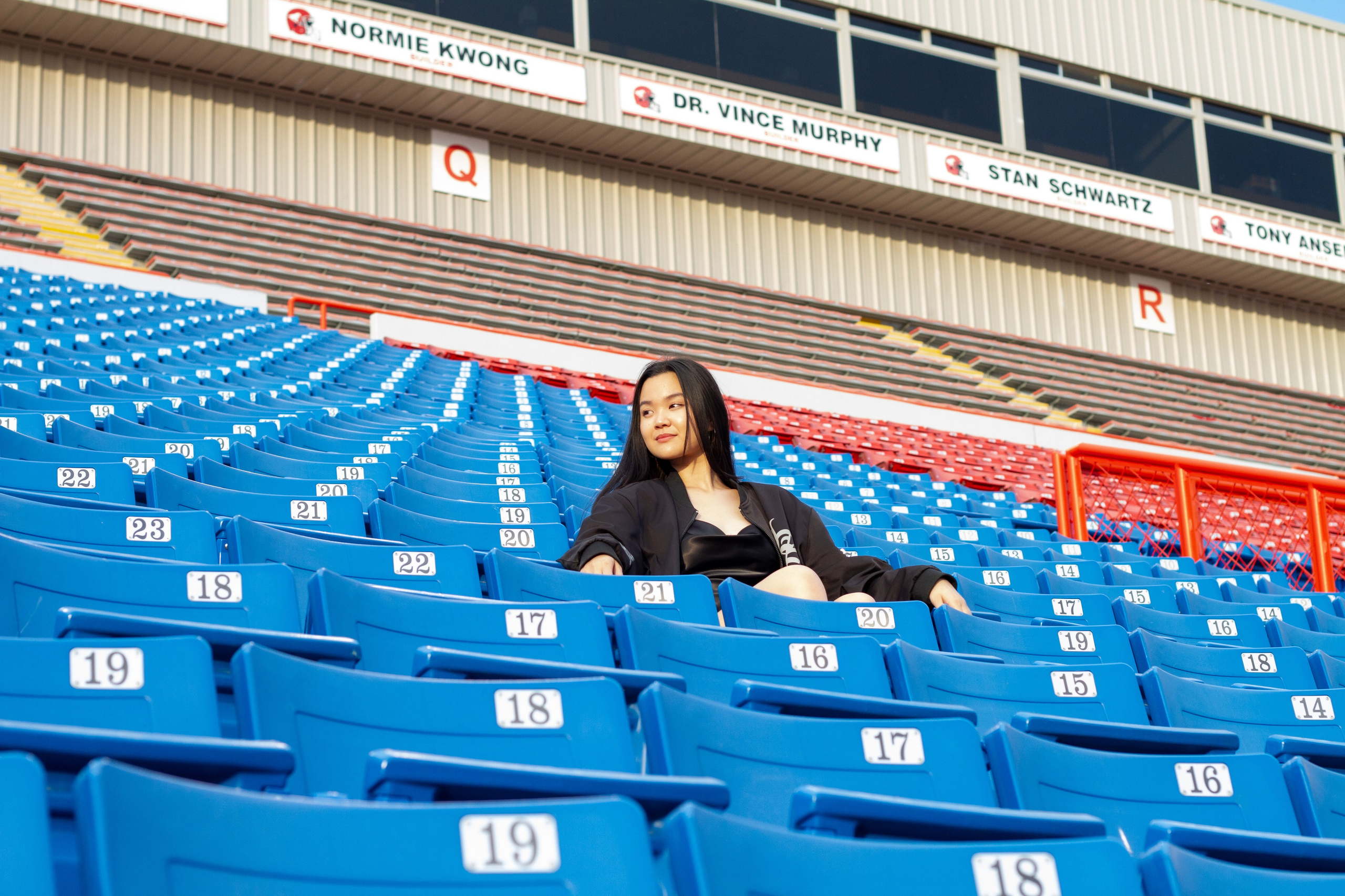 Model Ann at McMahon Stadium: A Stunning Photoshoot Under the Stadium Lights. ProFly Media Inc. — Cinematic photo and video production for brands, businesses, and spaces in Calgary