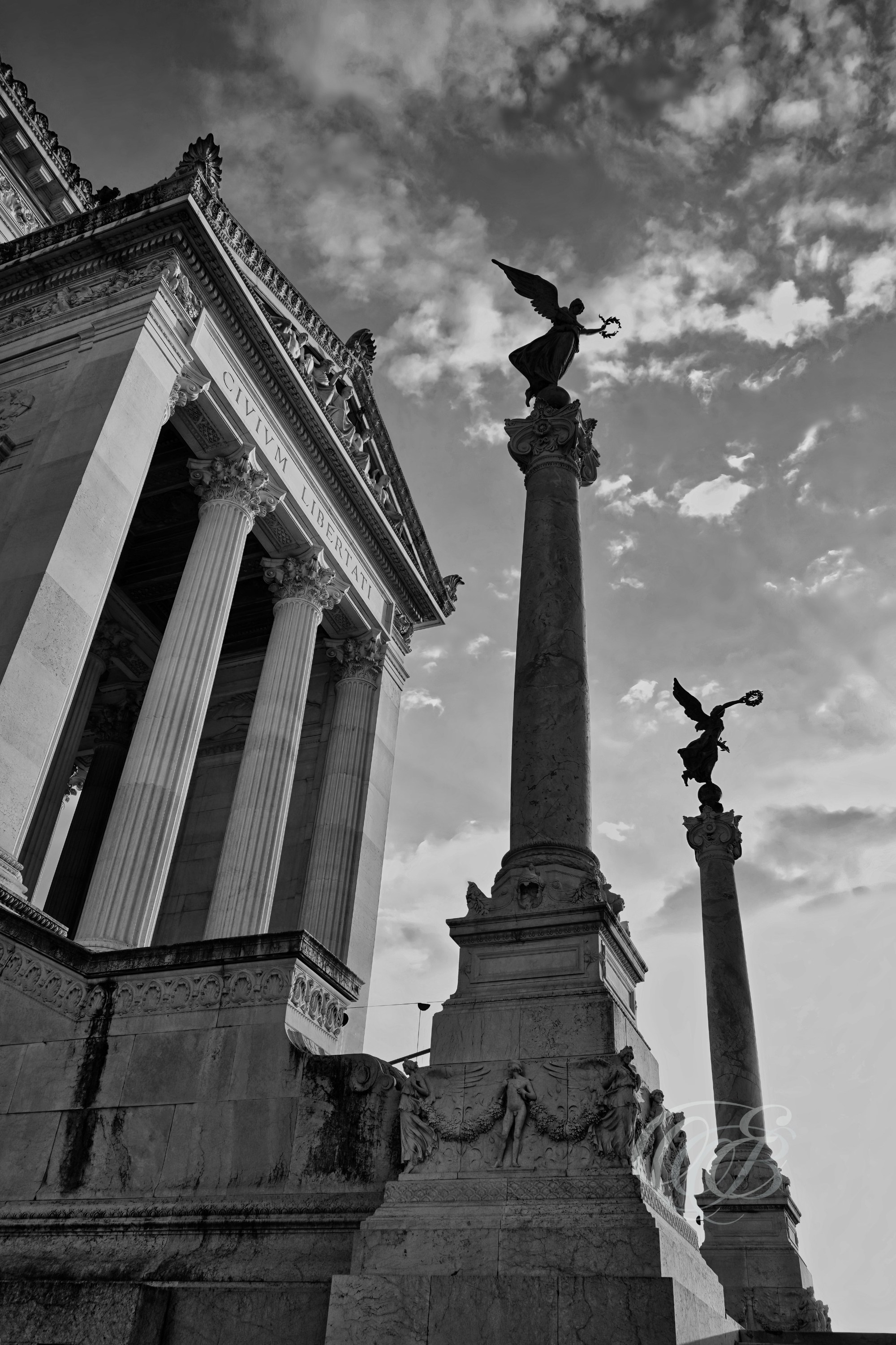 Rome Italy - Victor Emmanuel II Monument Angels of Glory - Eduardo Bartoli Fine Art Photography - Black and white fine art photograph of the Angels of Glory atop the Victor Emmanuel II Monument in Rome, Italy – photography by Eduardo Bartoli.