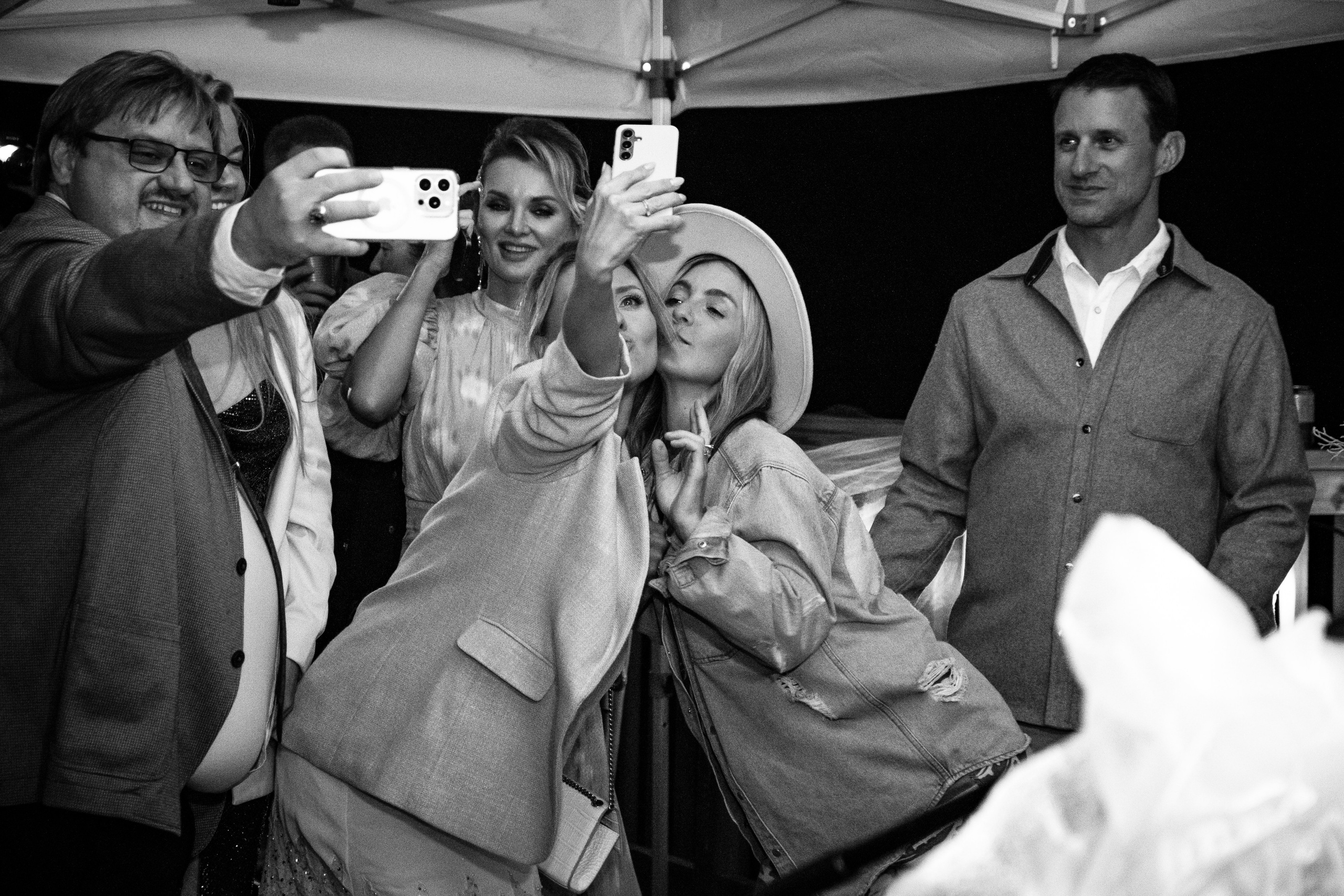 wedding reception candid with guests laughing