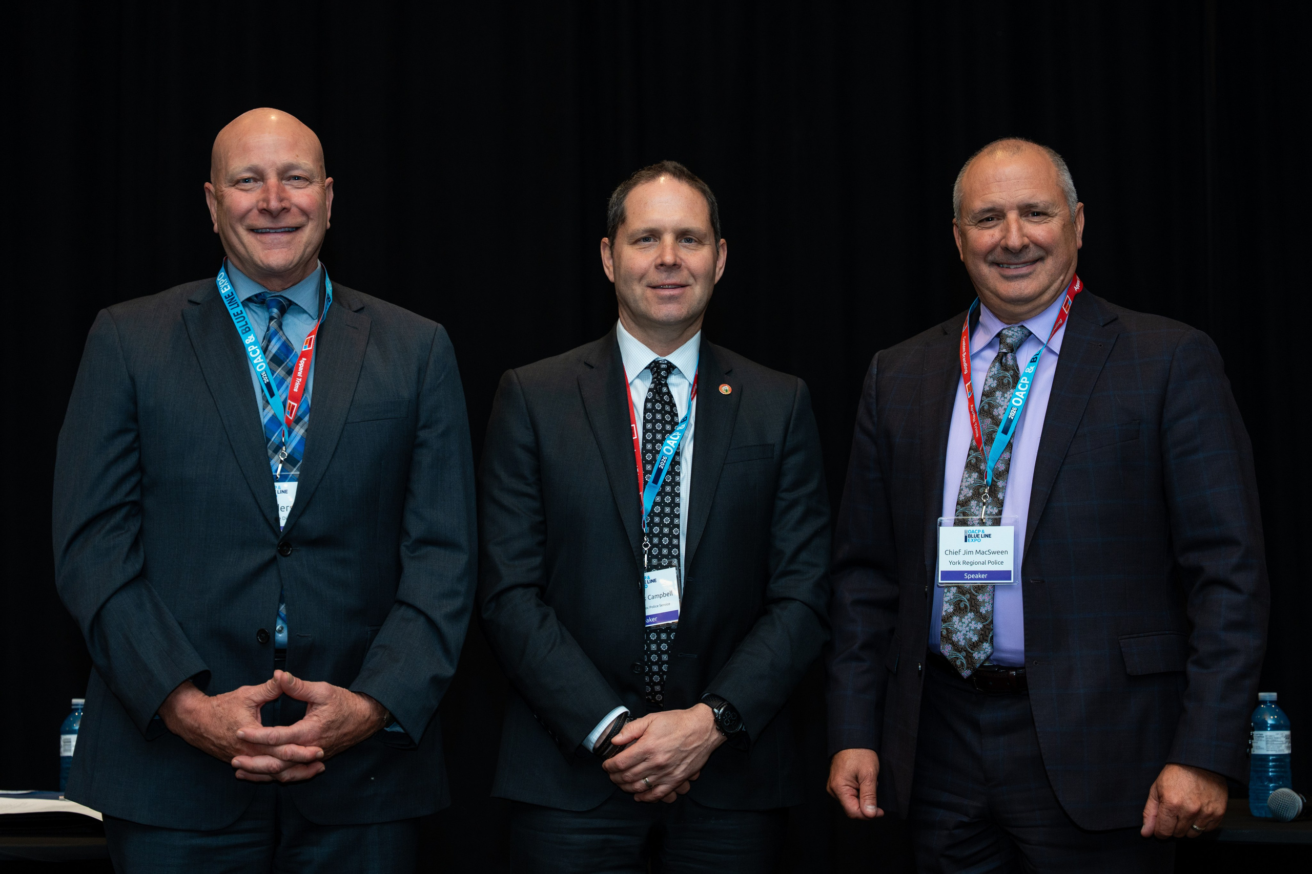 Formal group photo of officials seated, Blueline Expo 2026