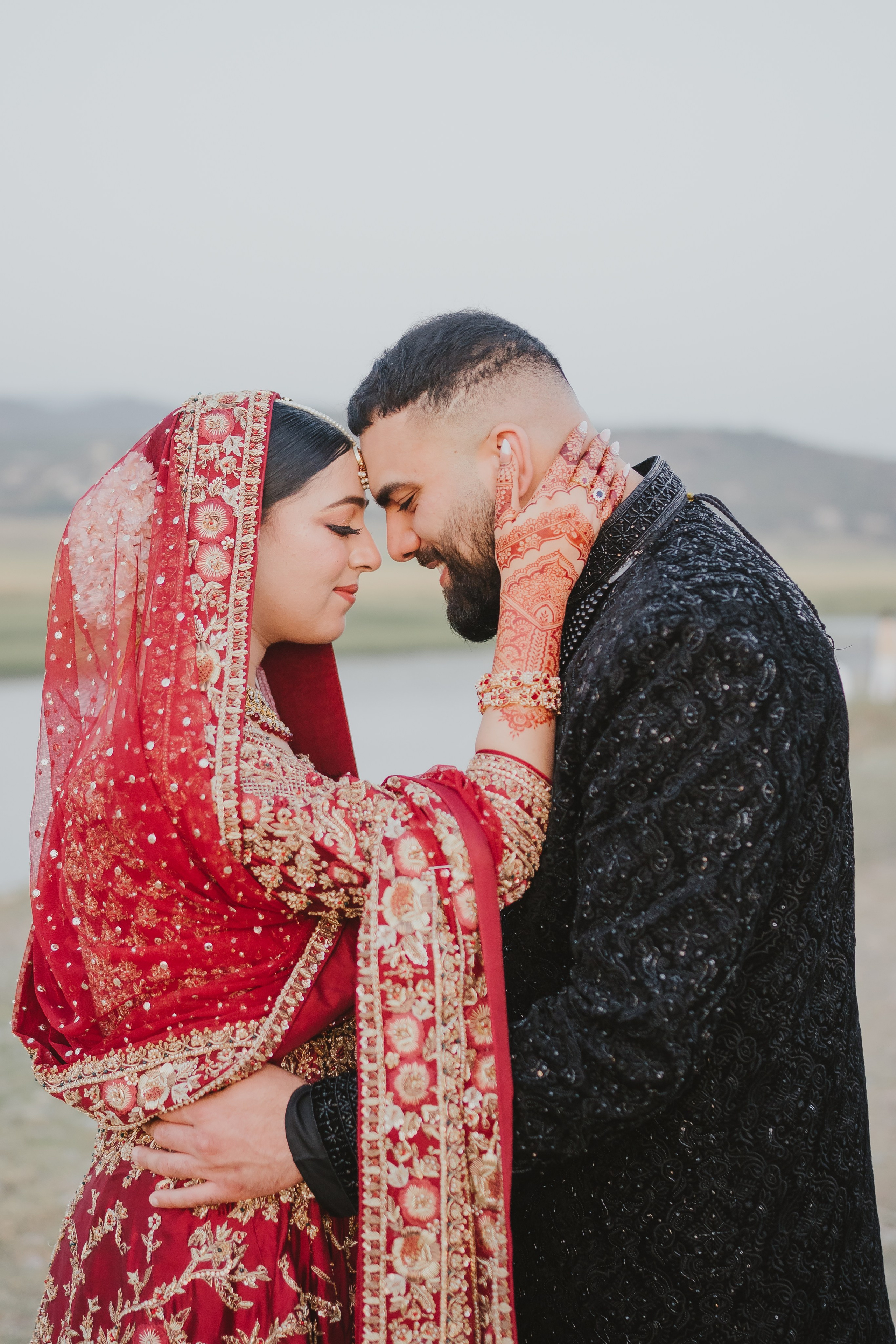 Couple shoot in the fields during sunset 