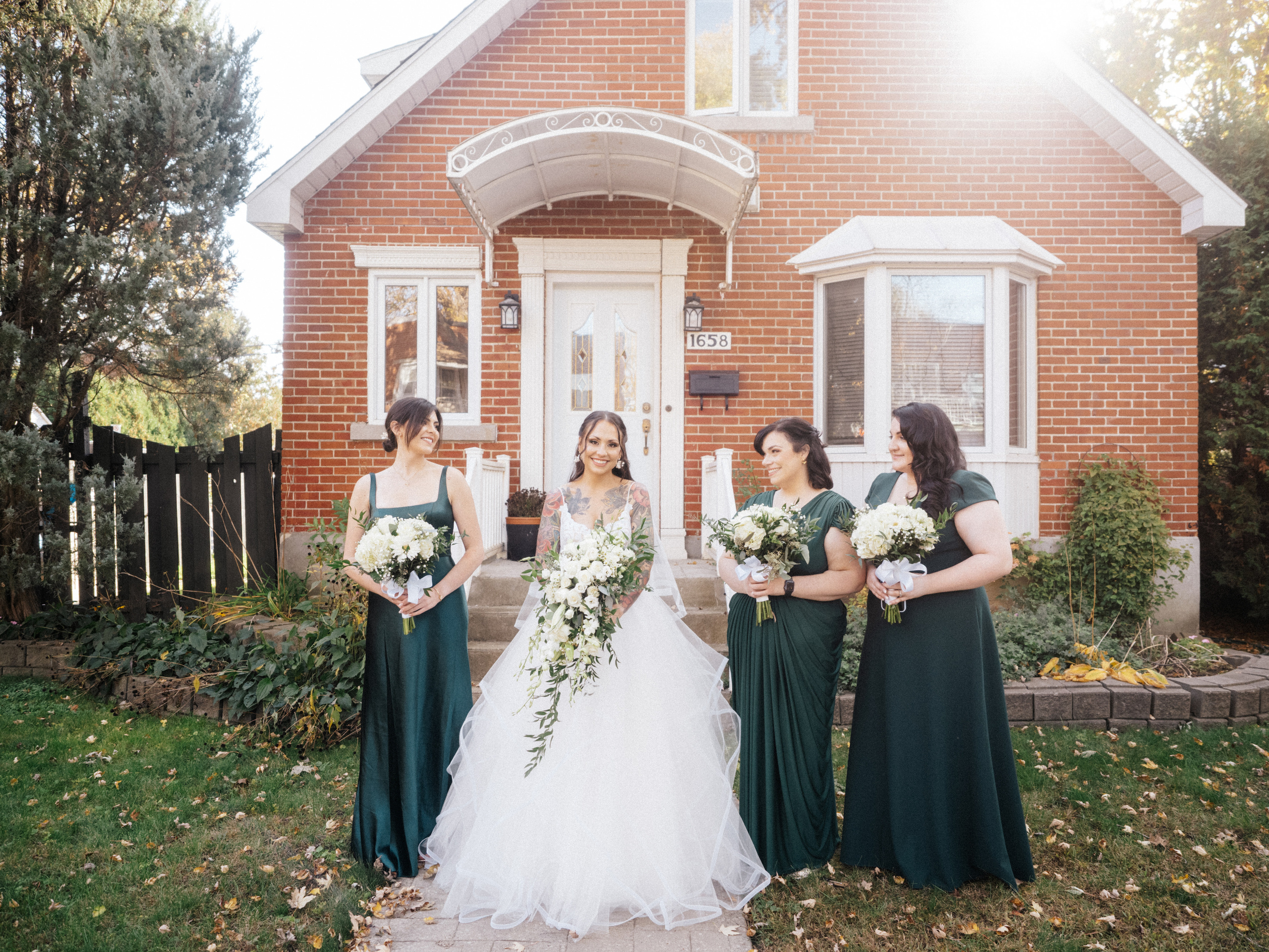 Bridal party in front of brides family's house in Montreal, Canada.