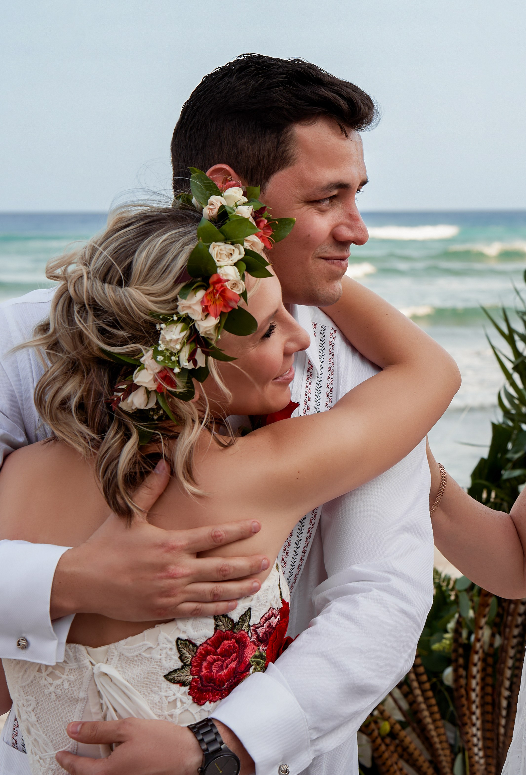 Bride and groom at beachfront wedding between Tulum and Cancun