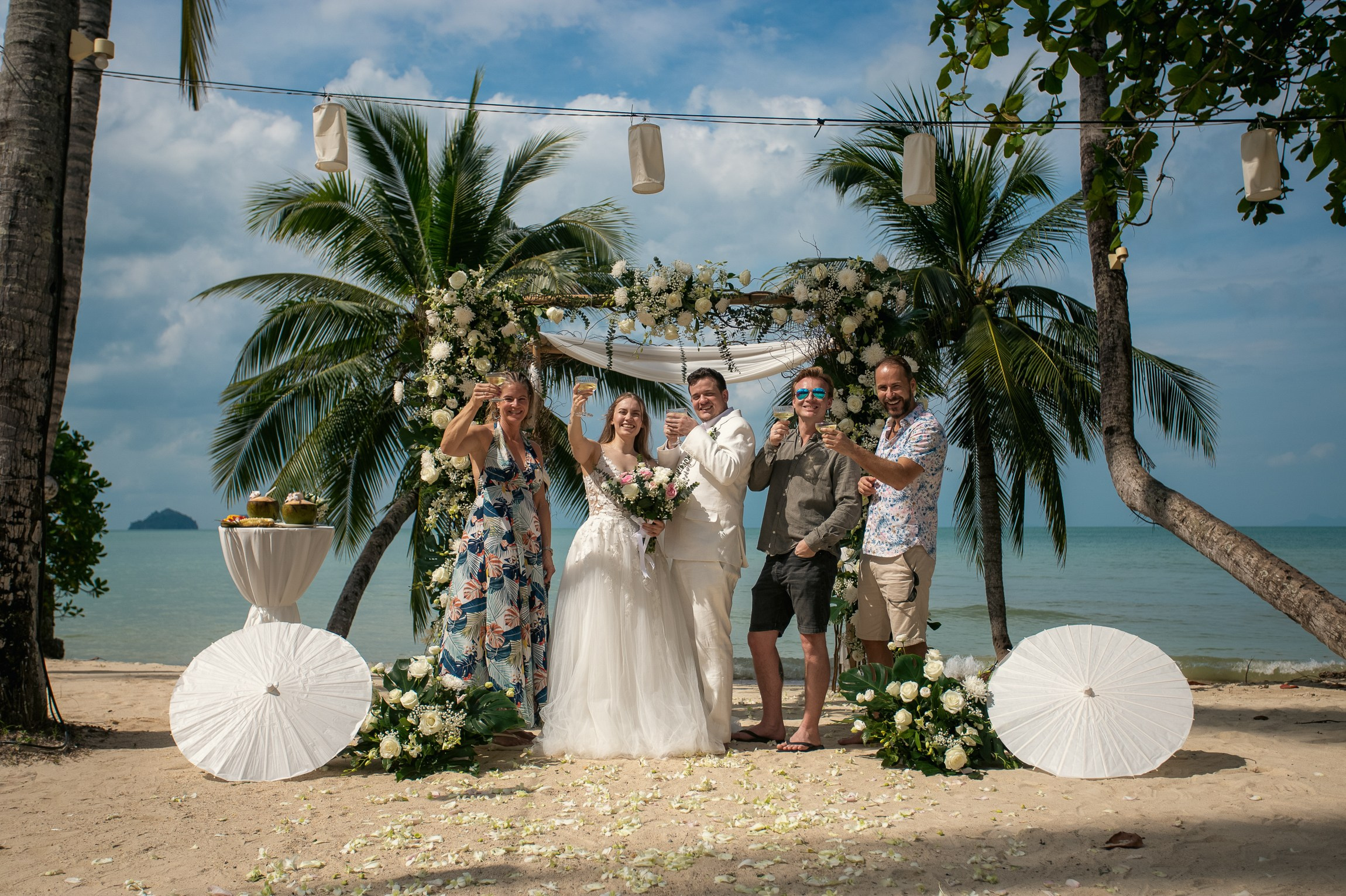 Elegant escape wedding for two on a beautiful beach in Koh Samui, Thailand with romantic wedding decorations