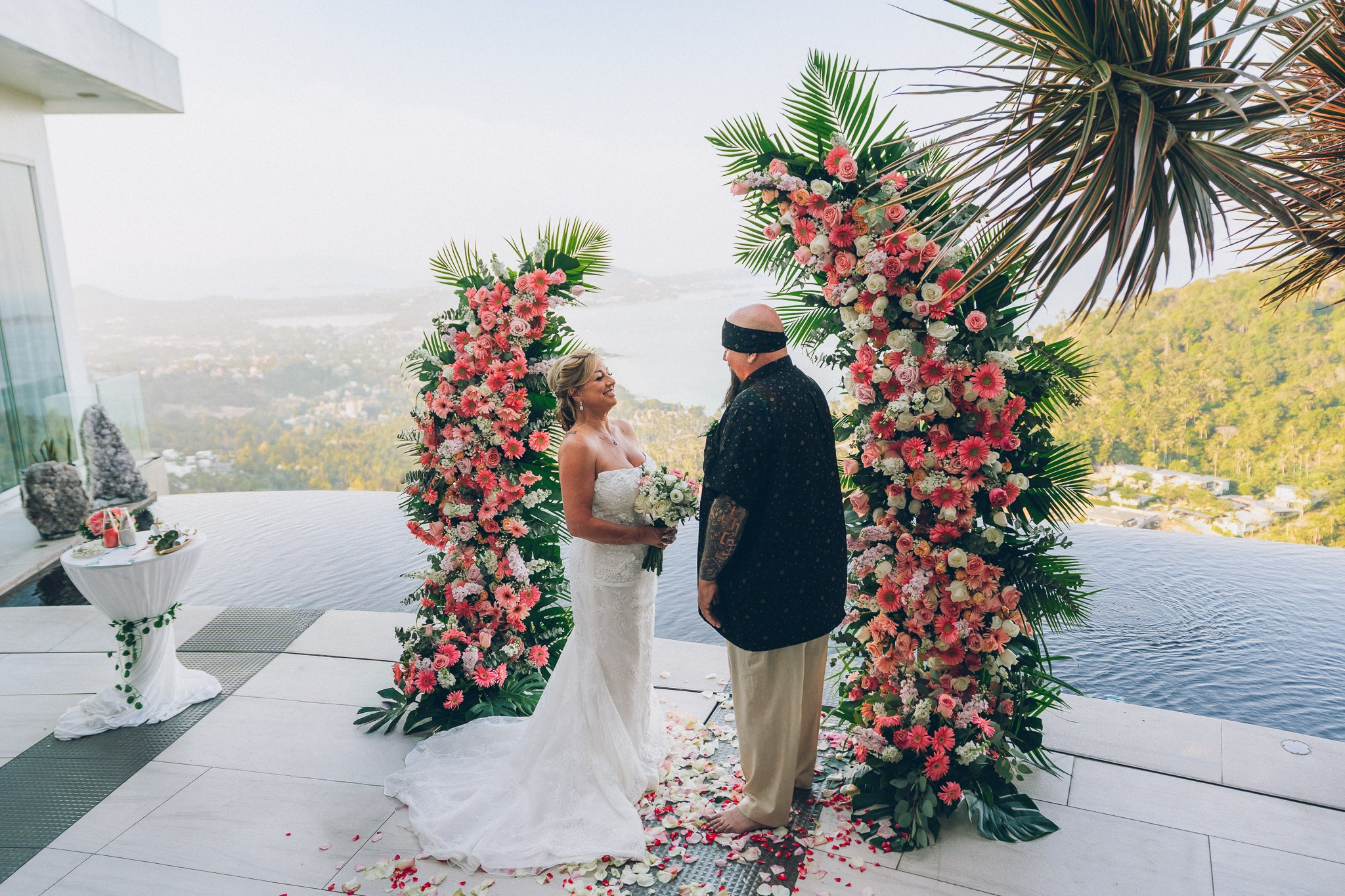 Bride and groom celebrating a sunset wedding at a villa in Koh Samui