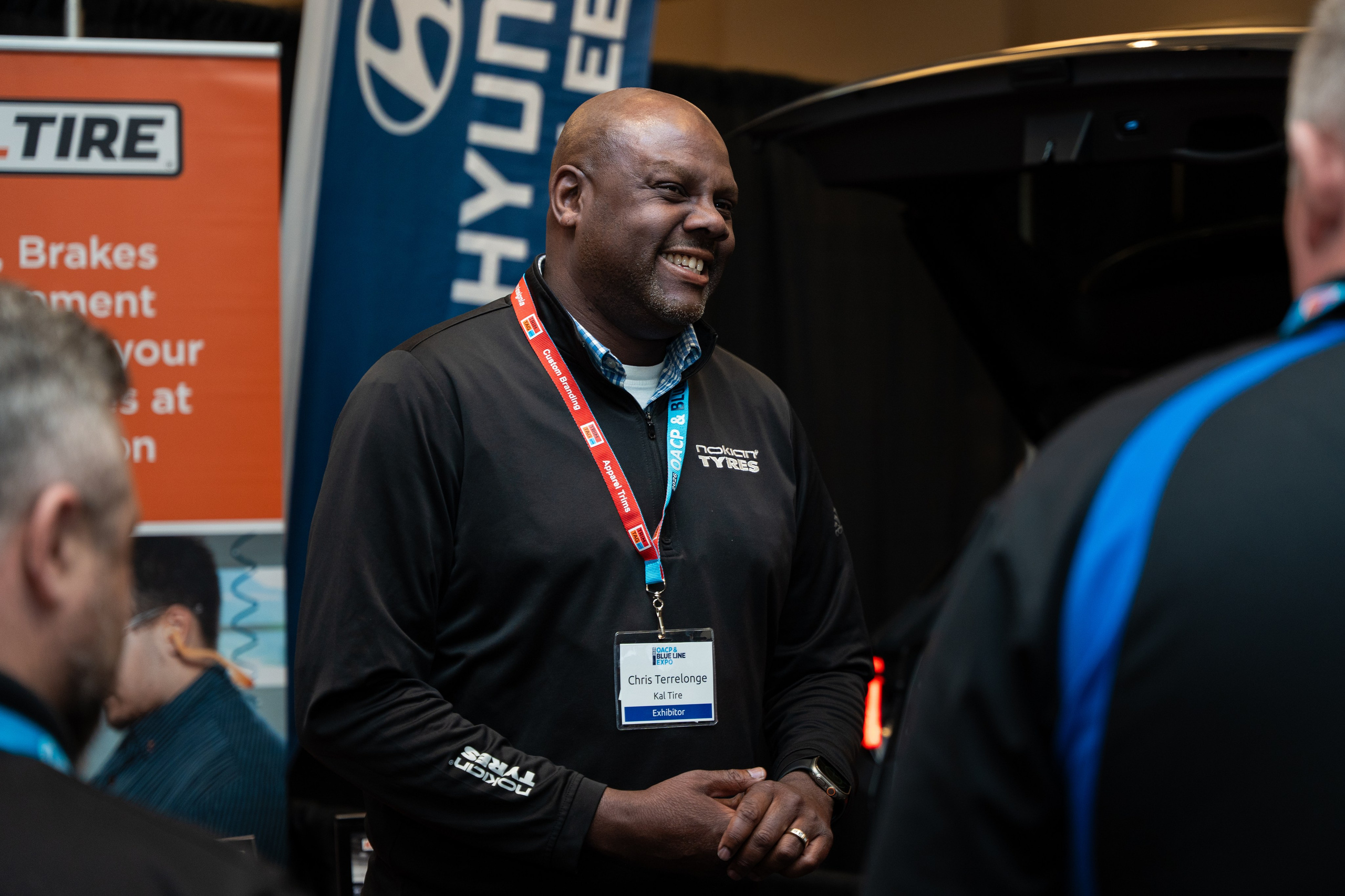 Hyundai branded exhibitor booth with staff, Blueline Expo