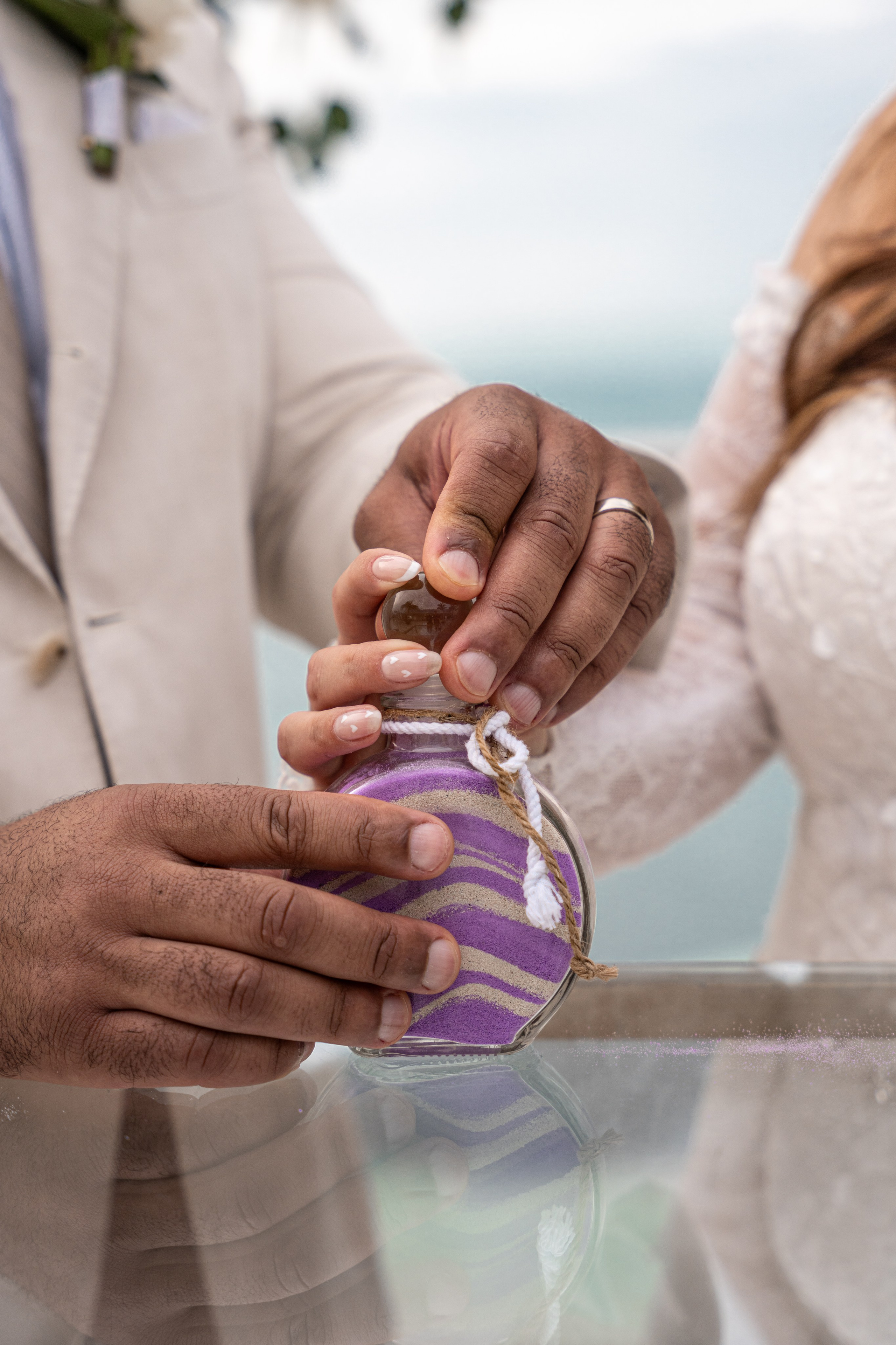 Fine art ceremony photo with white floral arch in Playa del Carmen