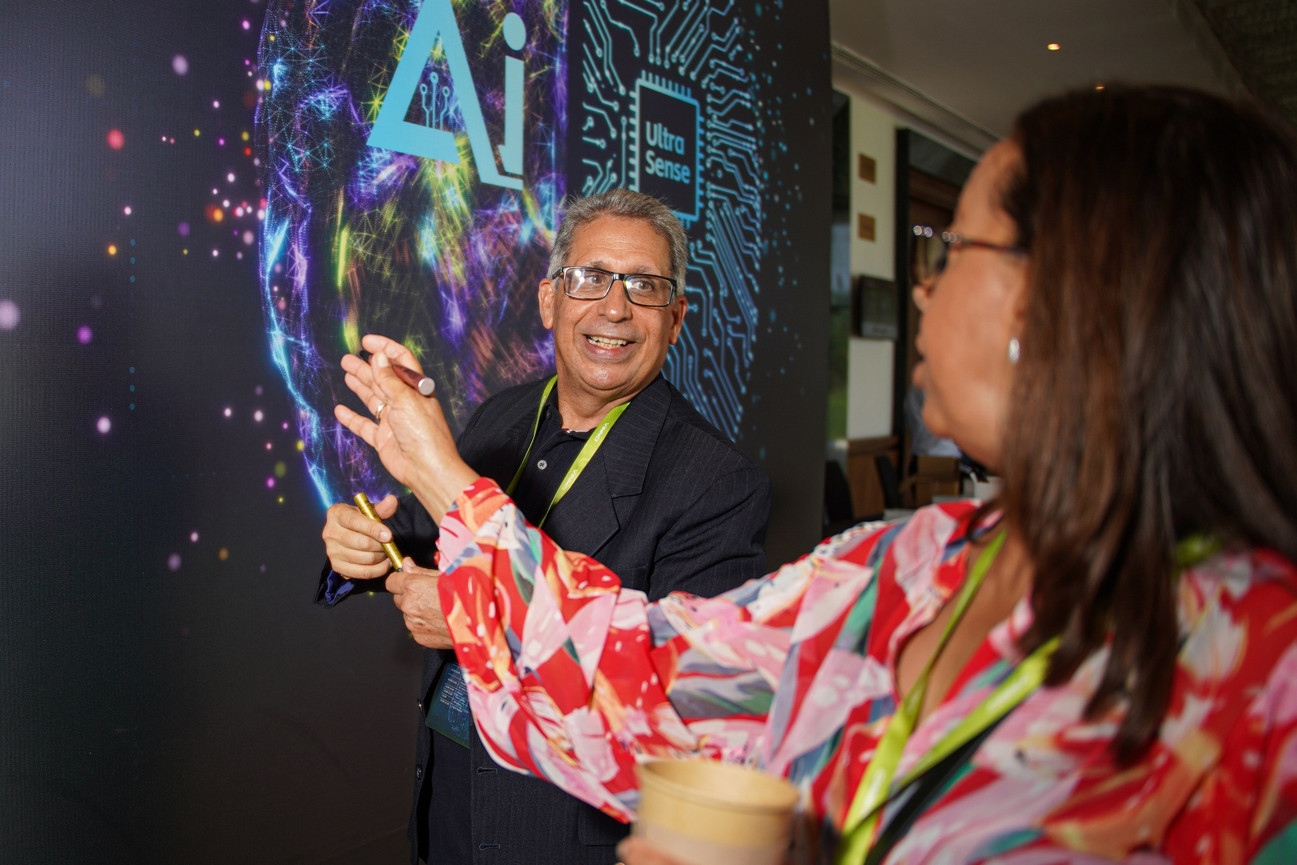 Guests exchanging contacts at corporate gathering.