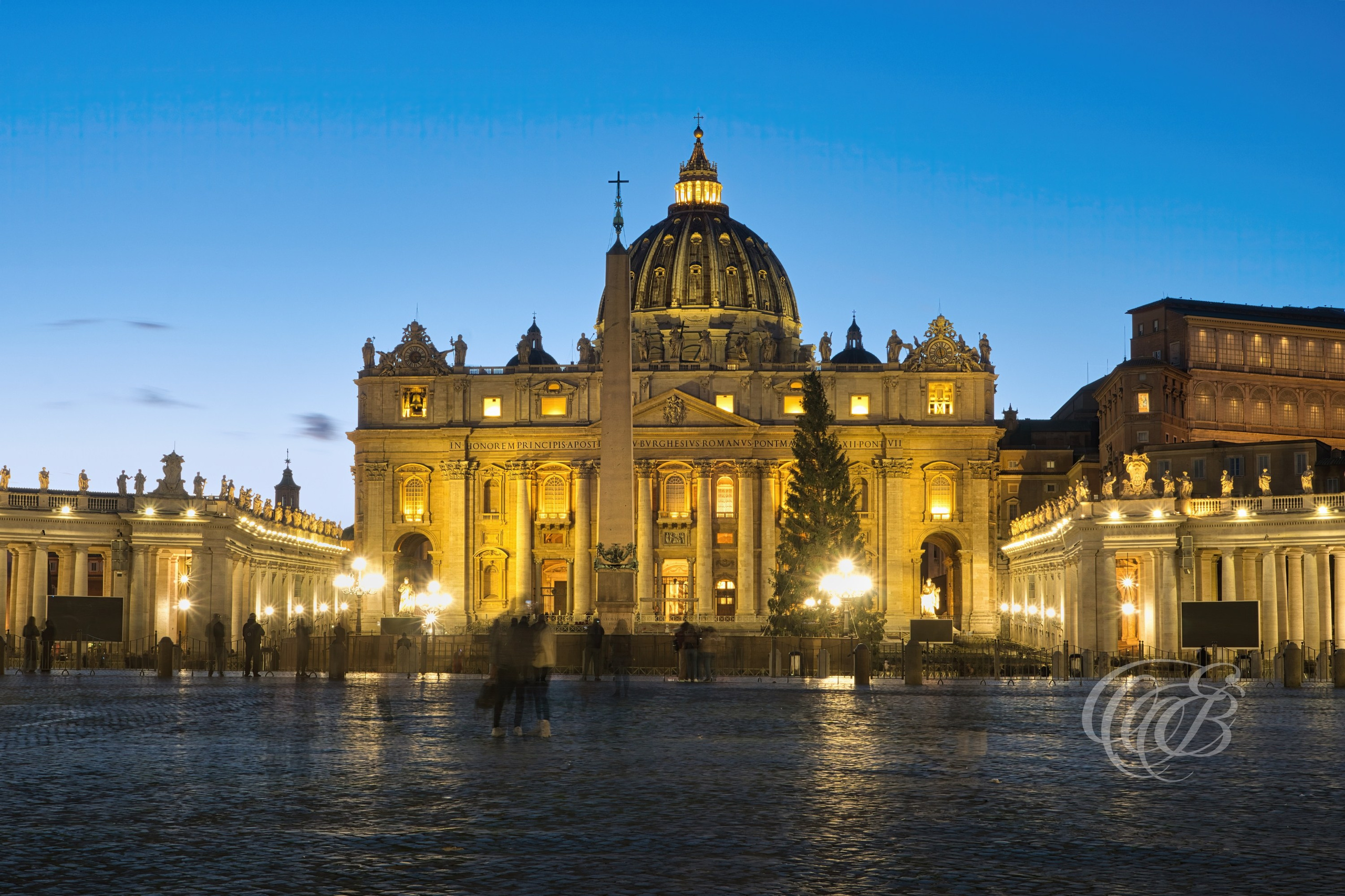 ITALY TRAVEL PHOTOGRAPHY – ITALY – ROME — Vatican at Dusk — View of Vatican City at sunset showing St. Peter’s Basilica dome and surrounding historic architecture silhouetted against the evening sky, Rome, Italy — Eduardo Bartoli Photography.