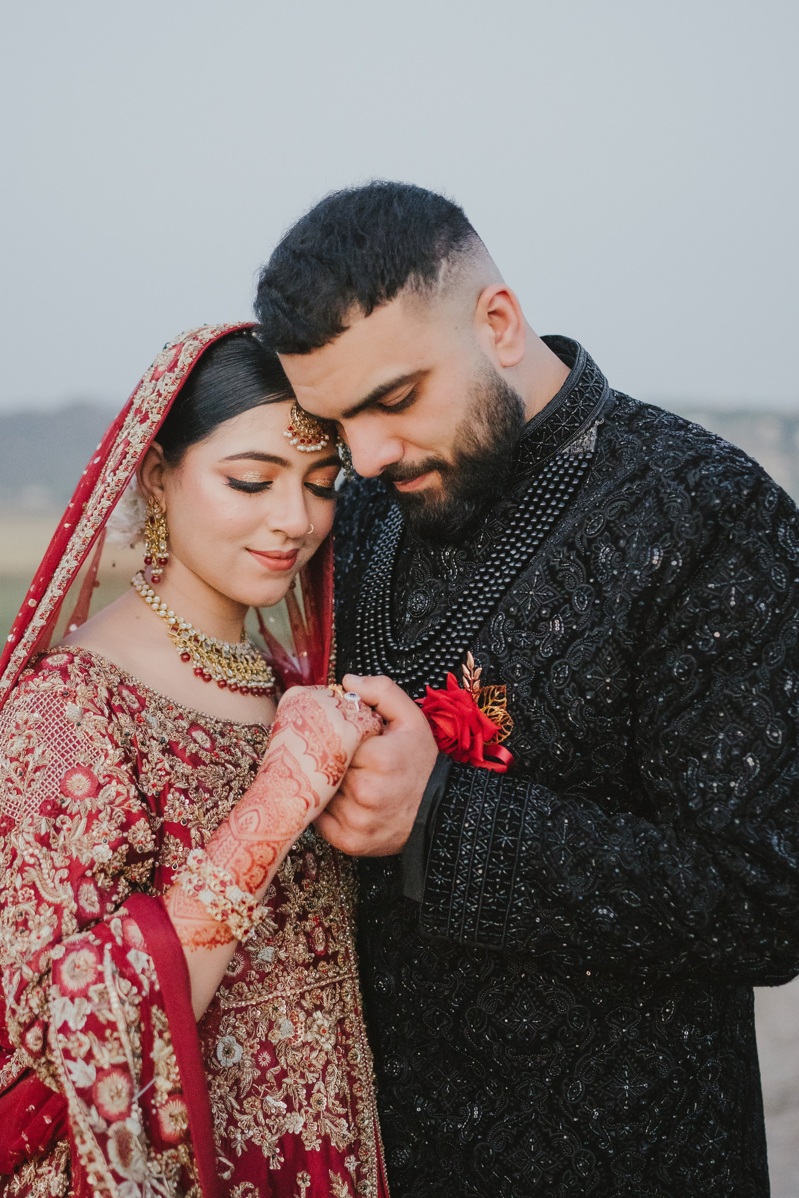 Couple shoot in the fields during sunset 