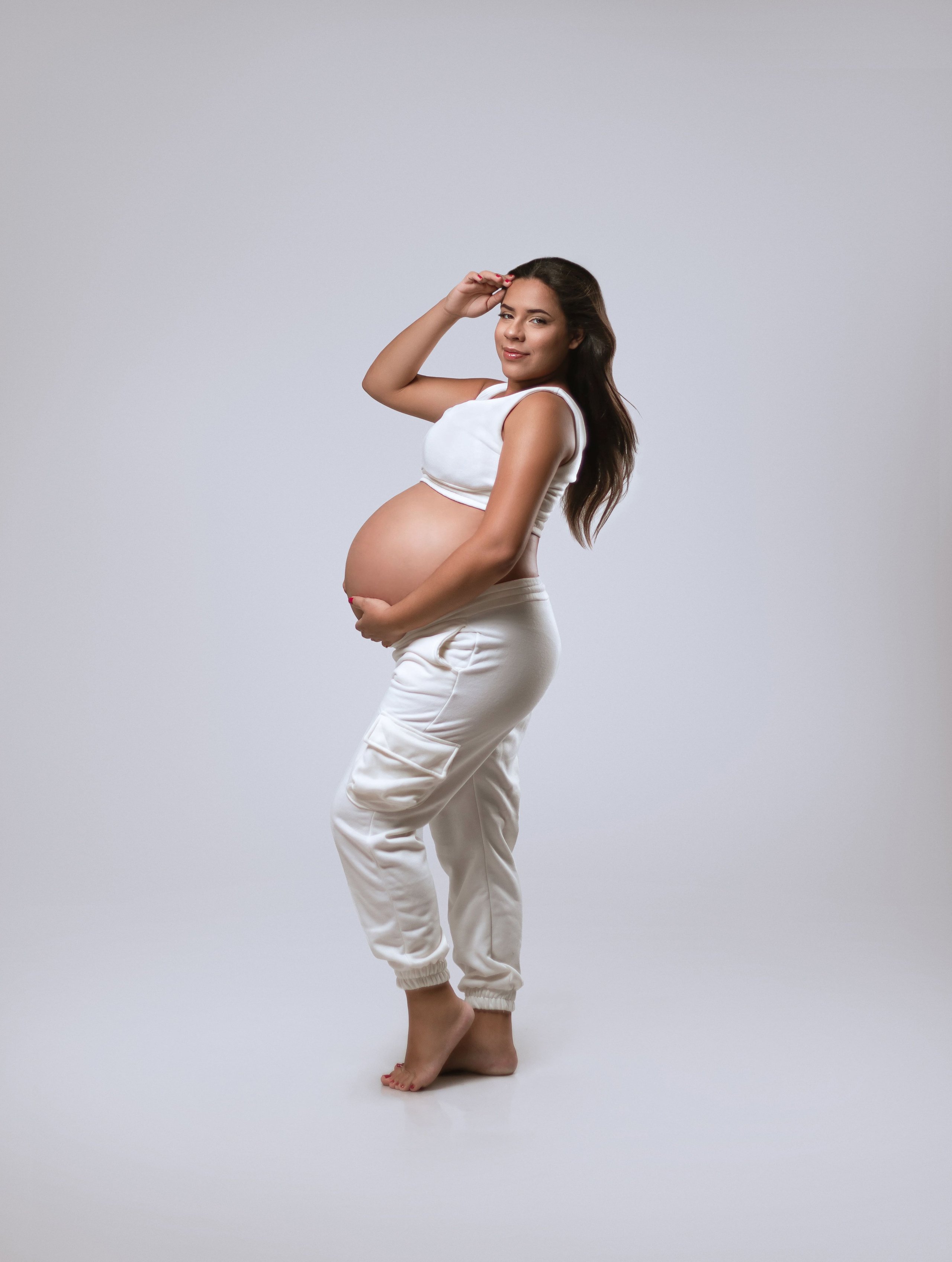 Ensaio fotográfico de gestante em São Paulo, criado para celebrar a maternidade e a beleza da mulher. Retratos delicados para guardar para sempre a história da chegada de um novo amor.