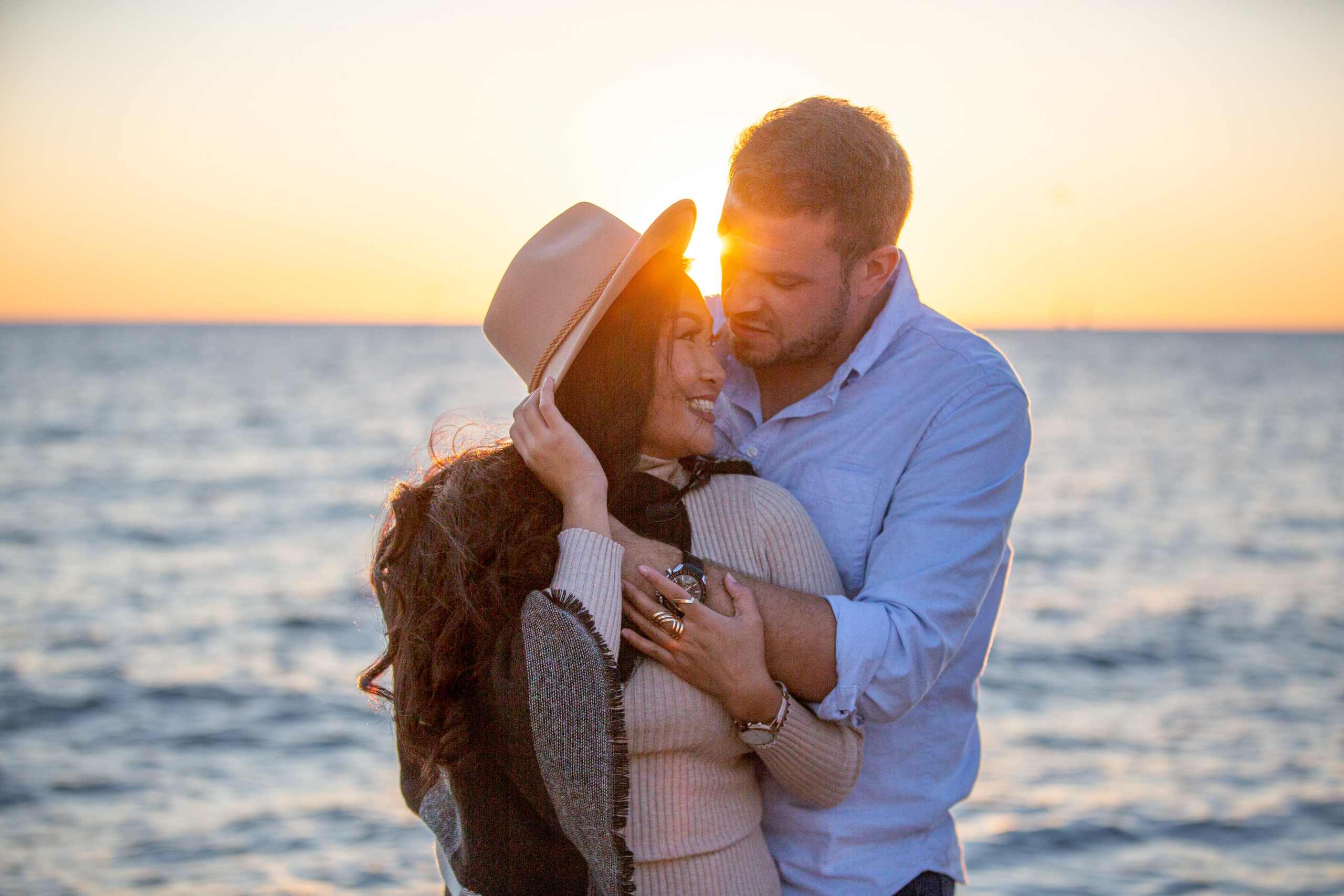 Romantic engagement portrait at Colchester Beach in Essex County, Ontario