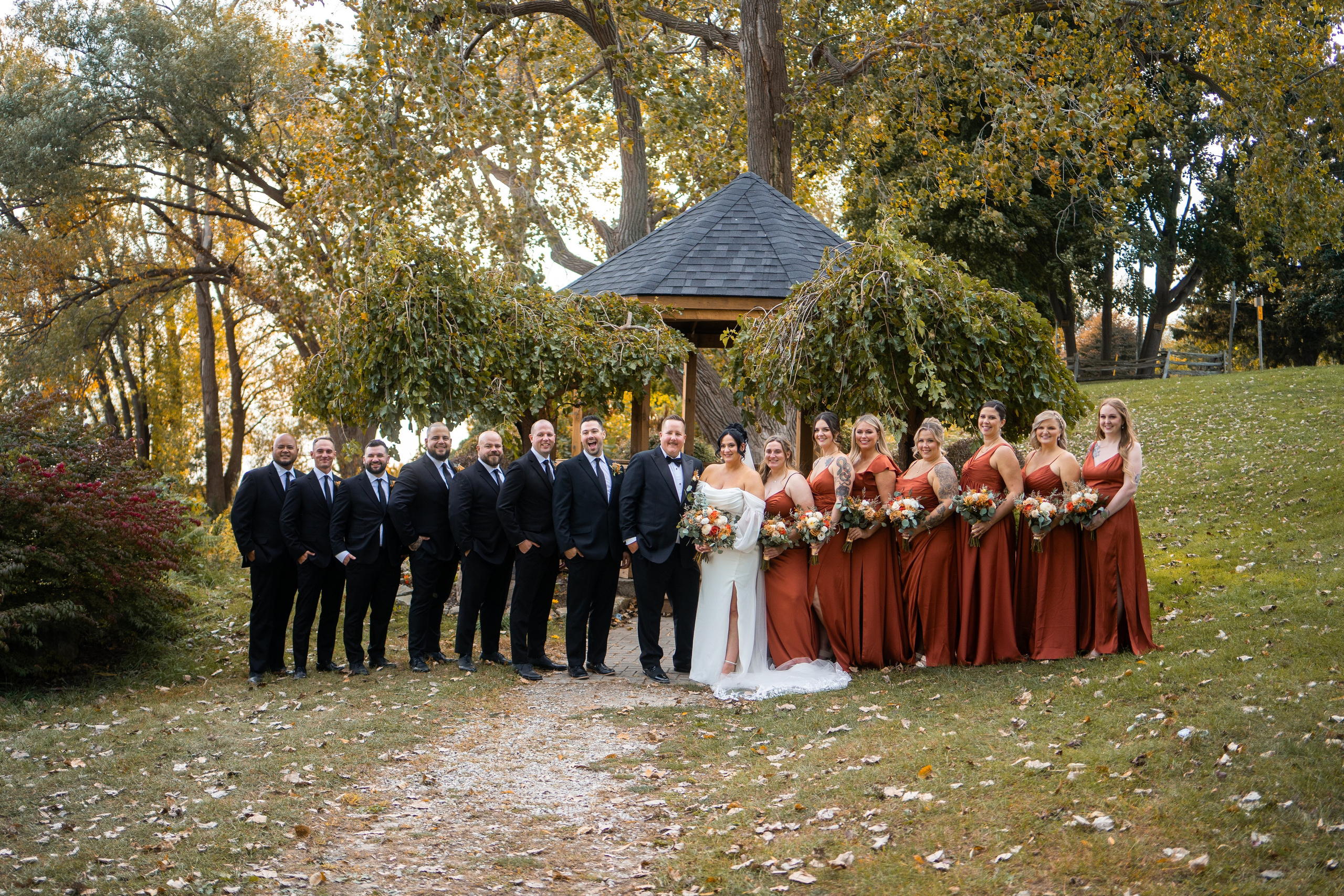 Bride and groom walking with their friends after the wedding ceremony in Windsor, Ontario