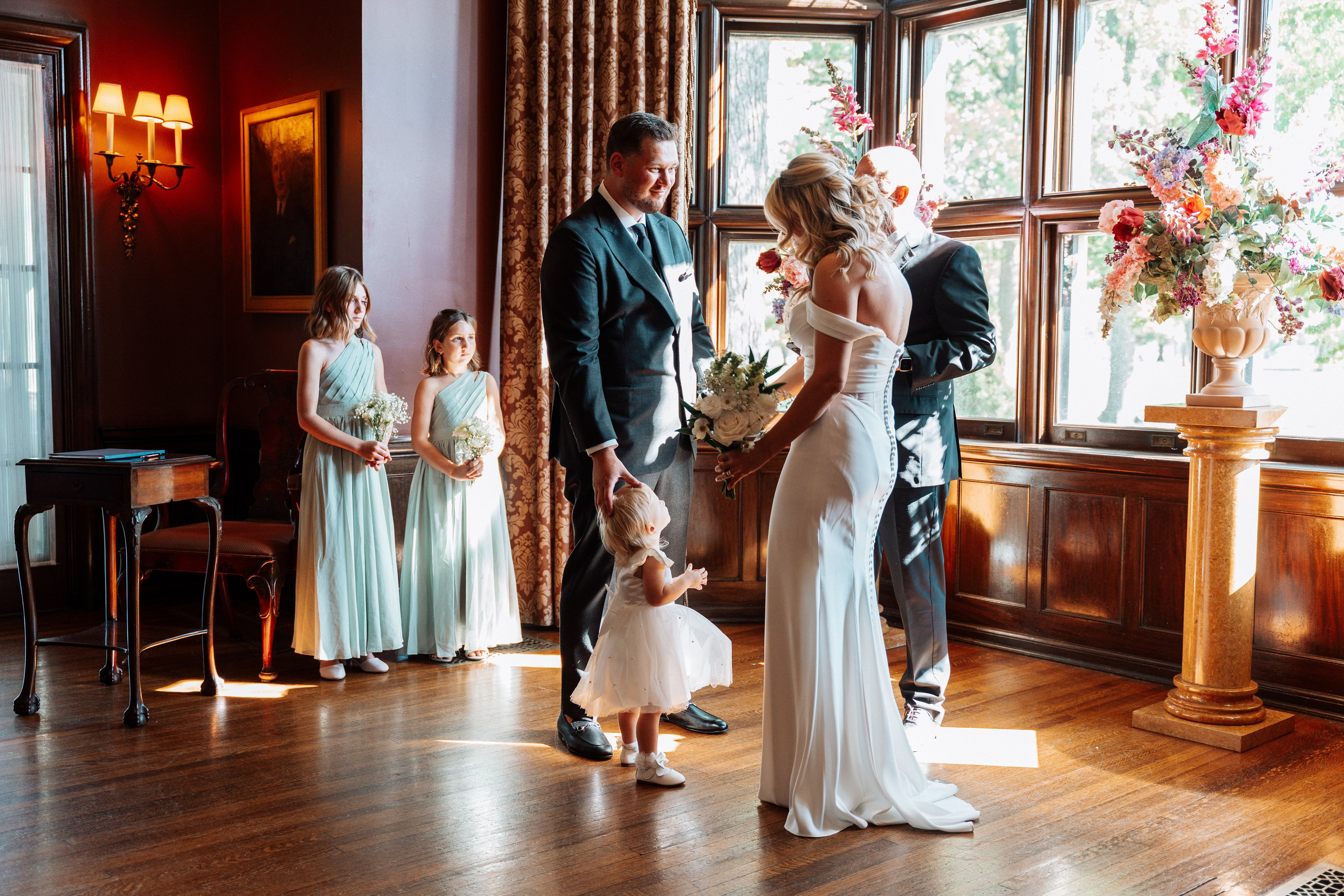 Bride and groom exchanging vows during their wedding ceremony in Ontario.