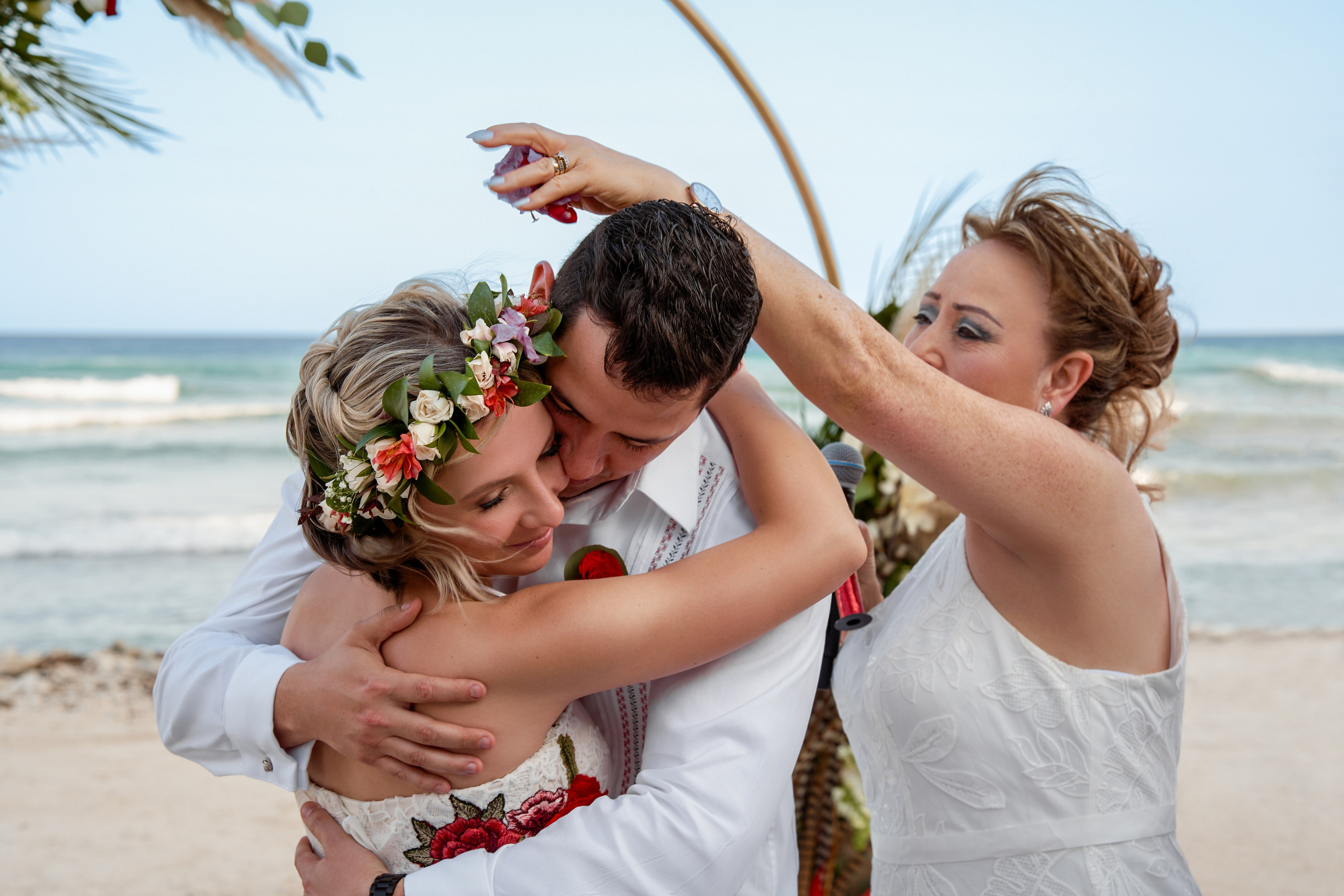 Bride and groom during beach wedding in Cancun