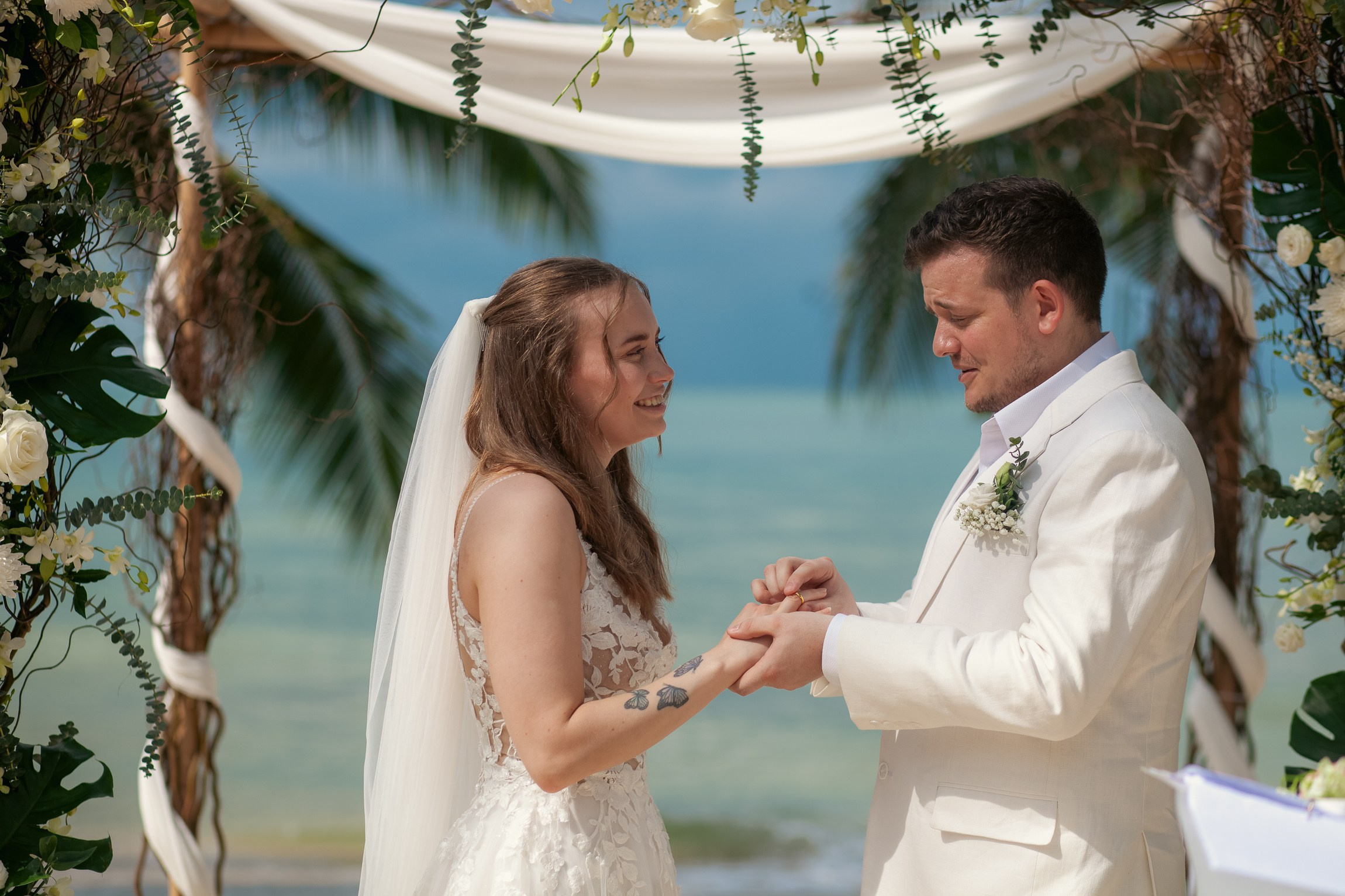 Elegant escape wedding for two on a beautiful beach in Koh Samui, Thailand with romantic wedding decorations