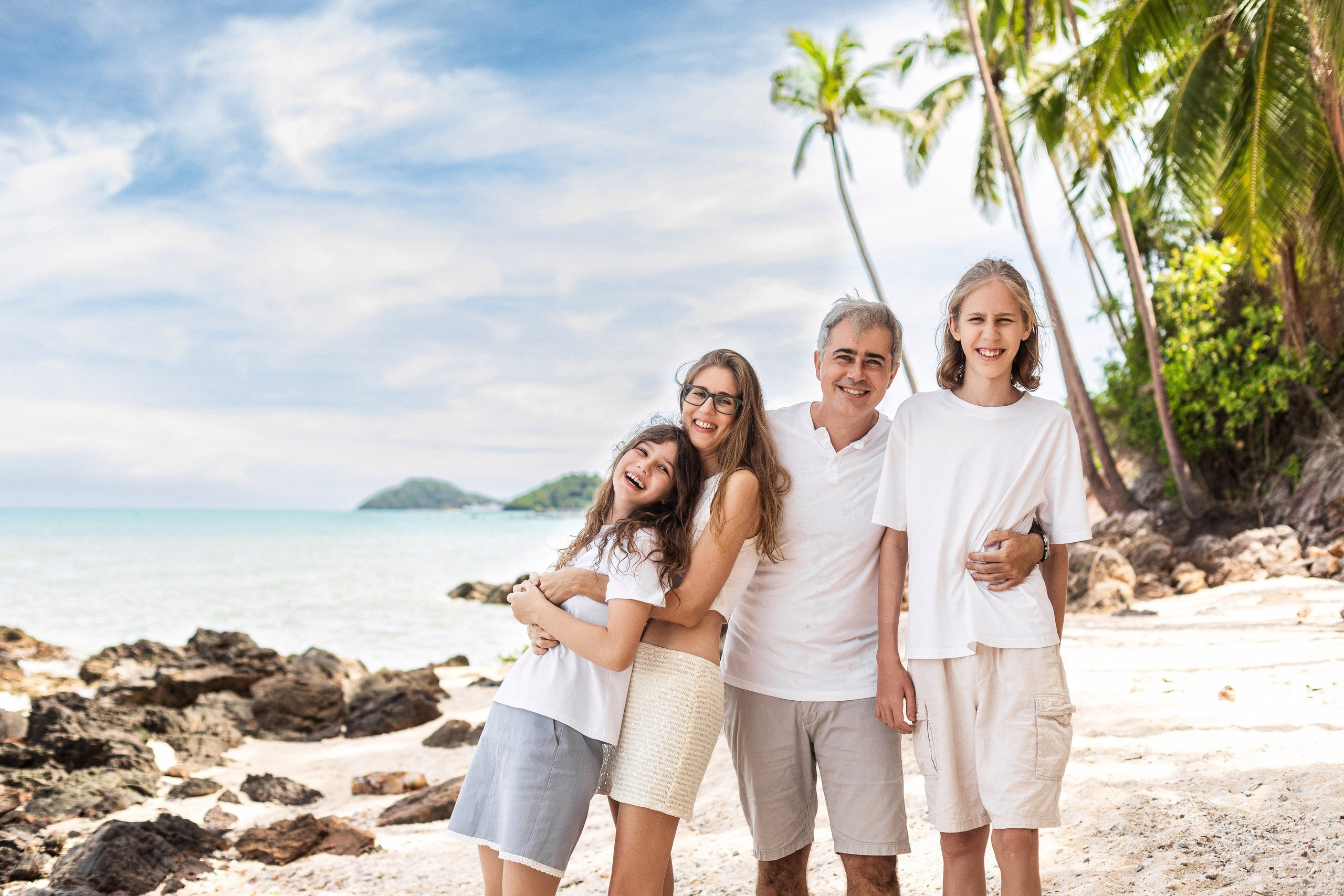 Family photoshoot at sunset on Koh Samui beach