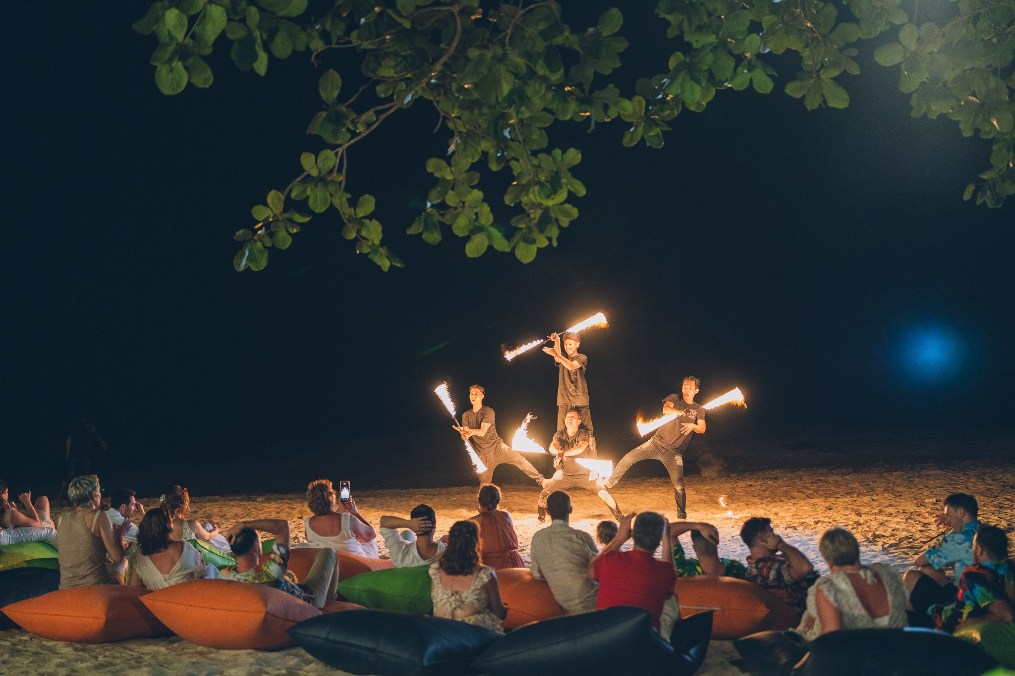 Professional fire dancers performing at a luxury wedding in Thailand