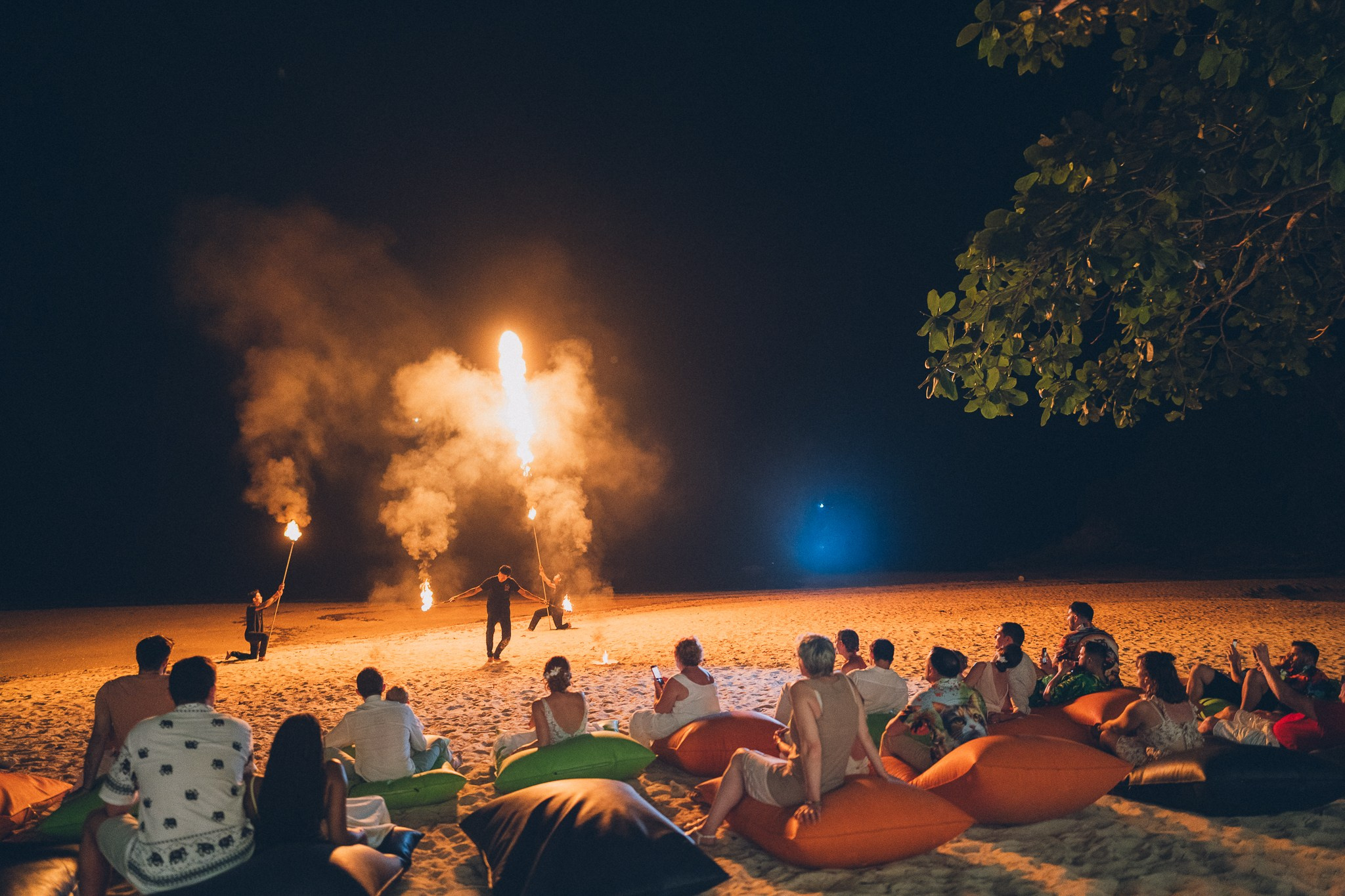 Professional fire dancers performing at a luxury wedding in Thailand