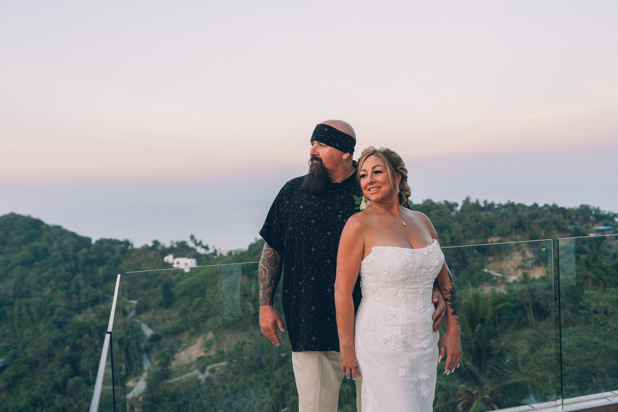 Bride and groom celebrating a sunset wedding at a villa in Koh Samui