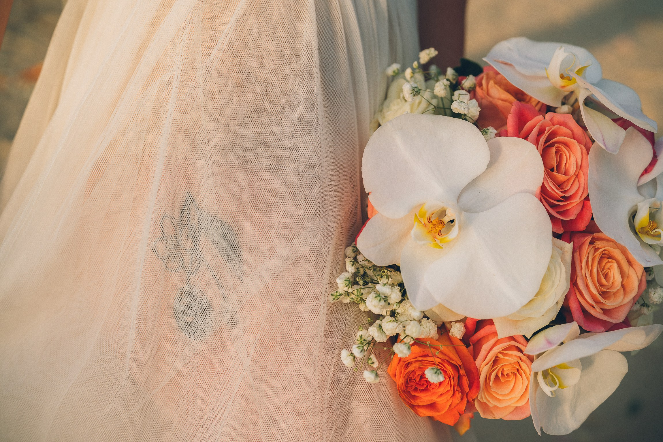 Romantic escape wedding ceremony for two on a secluded beach in Koh Samui, Thailand at sunset