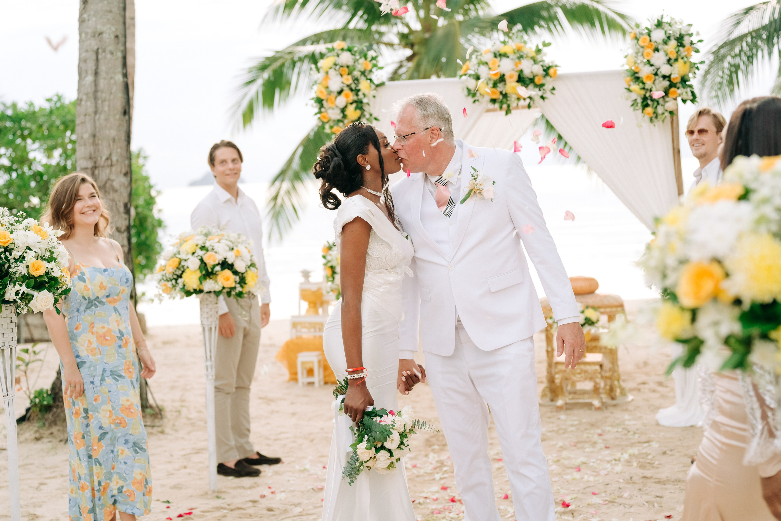 Romantic Buddhist wedding ceremony with guests in Koh Samui, Thailand